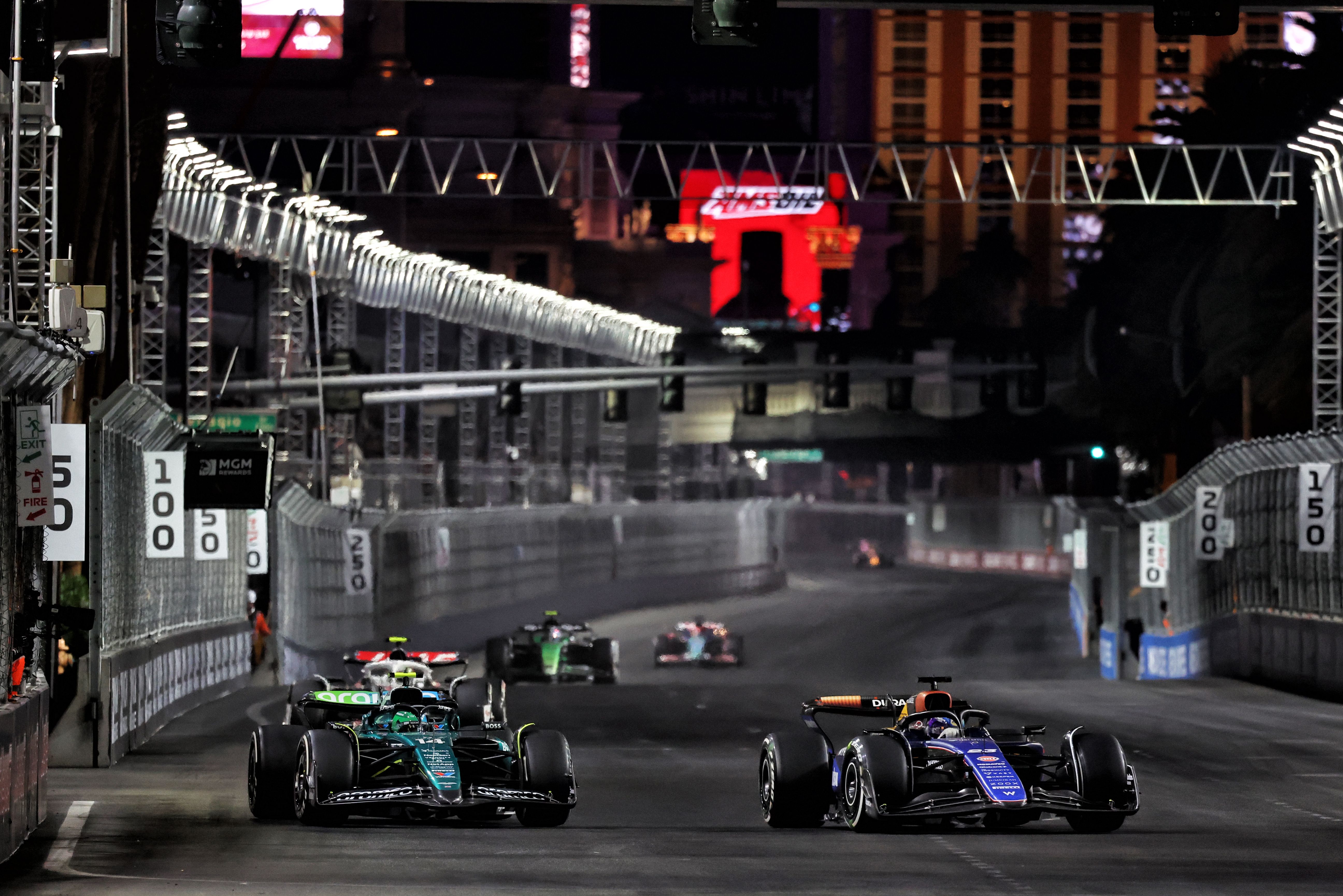 Alonso and Albono go wheel-to-wheel.