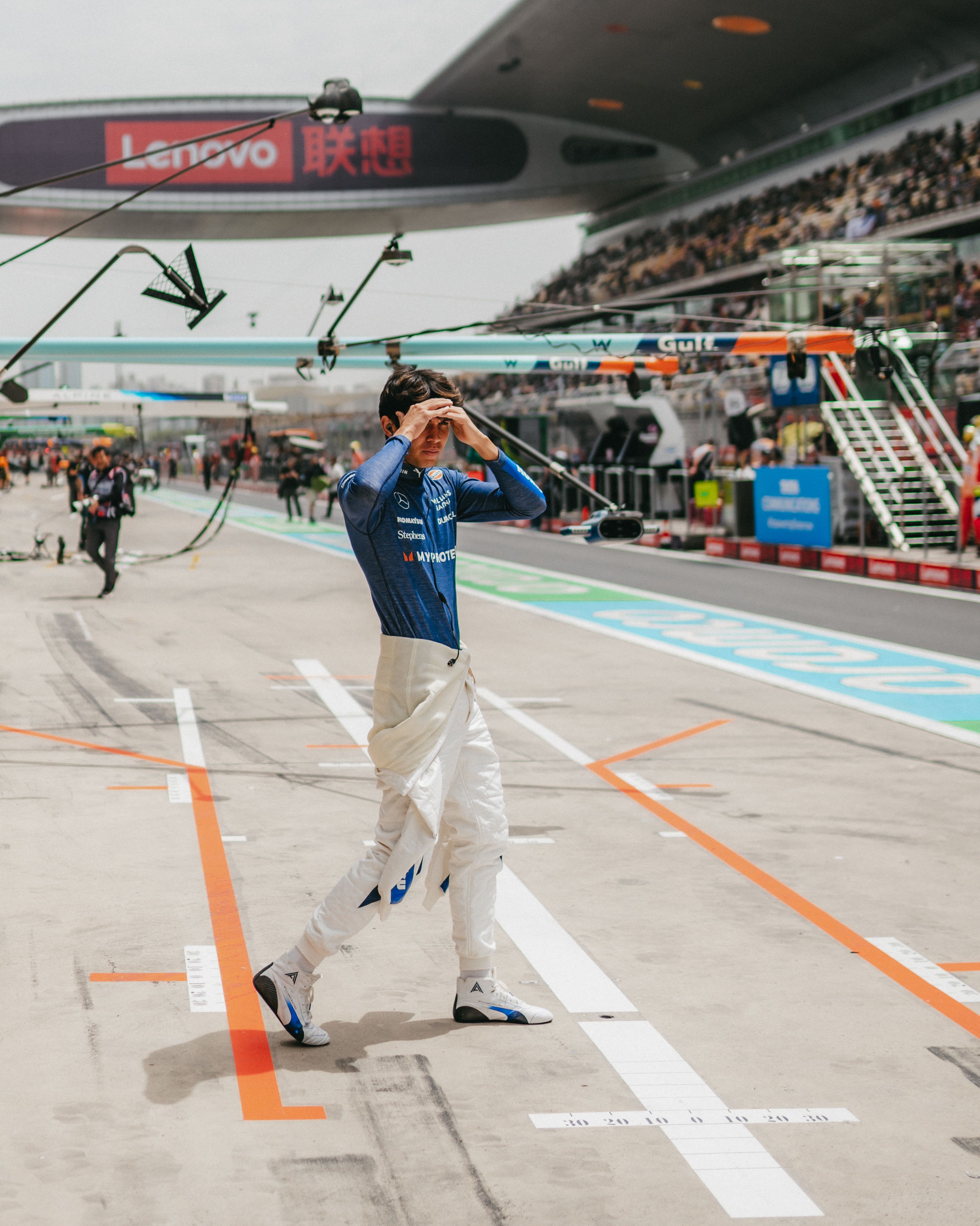 Alex checks out the view from the pit lane.