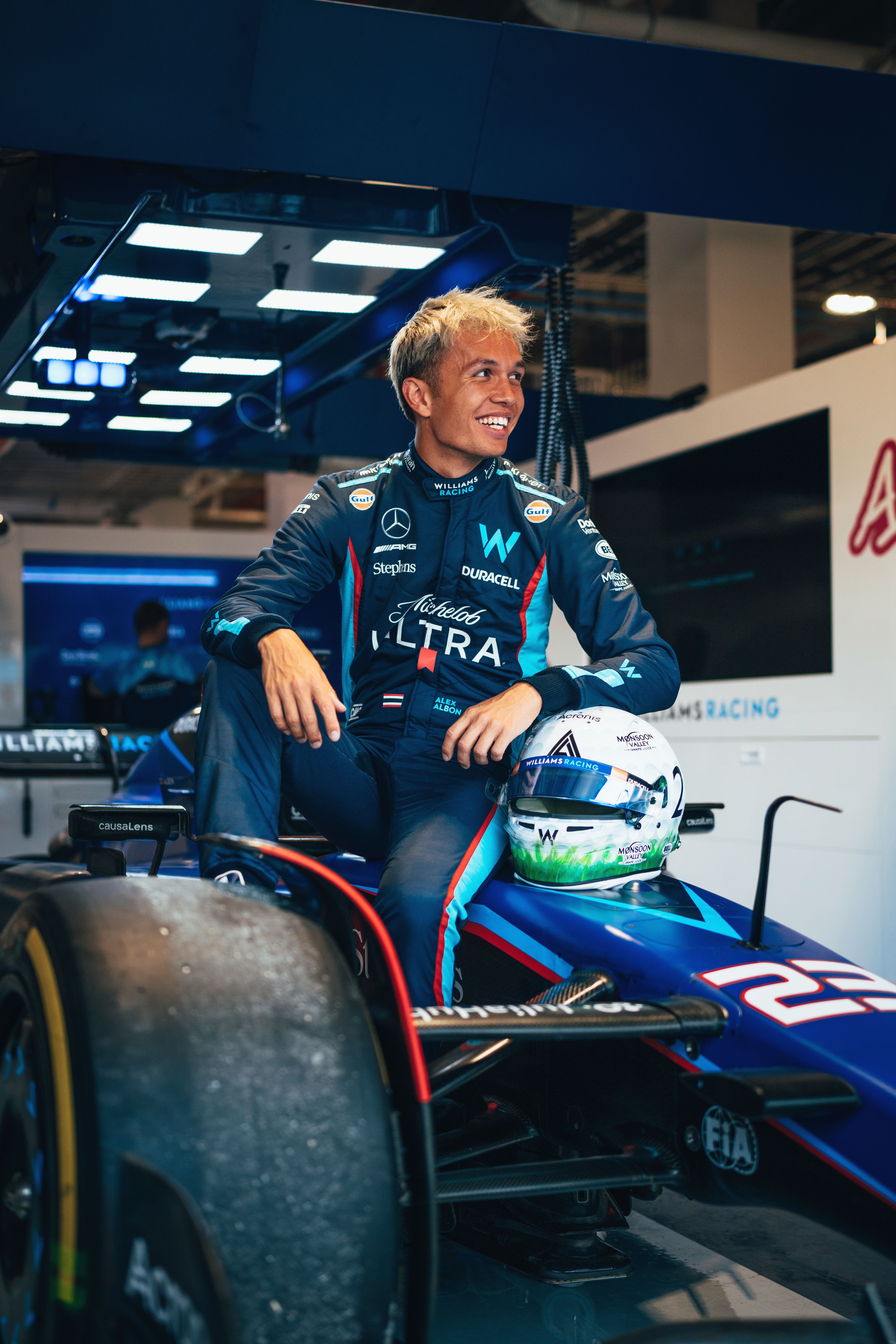 All smiles in the garage.