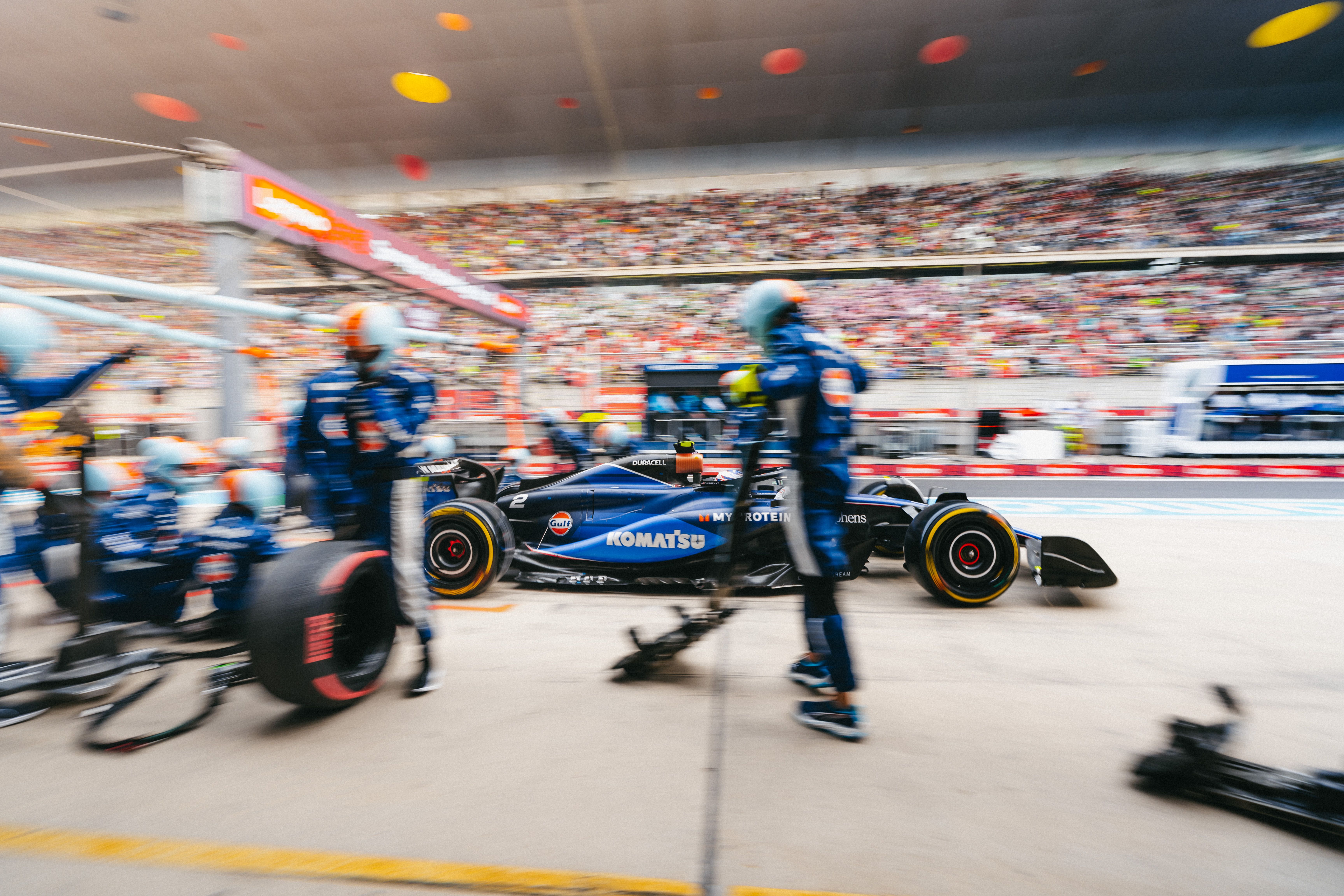 The pit crew rush into action to get Logan back out on track.
