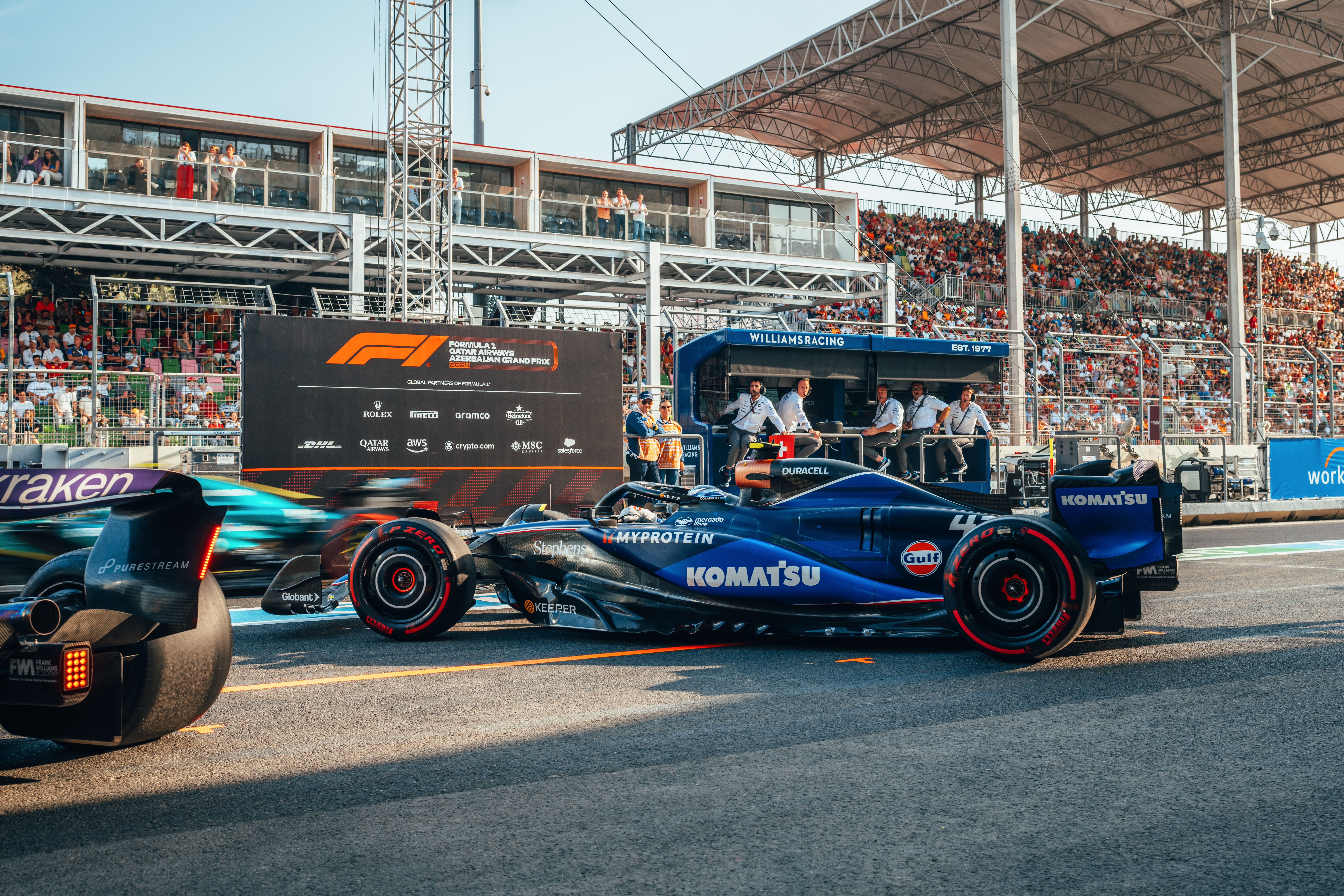 Joining the Qualifying queue in a busy pit lane