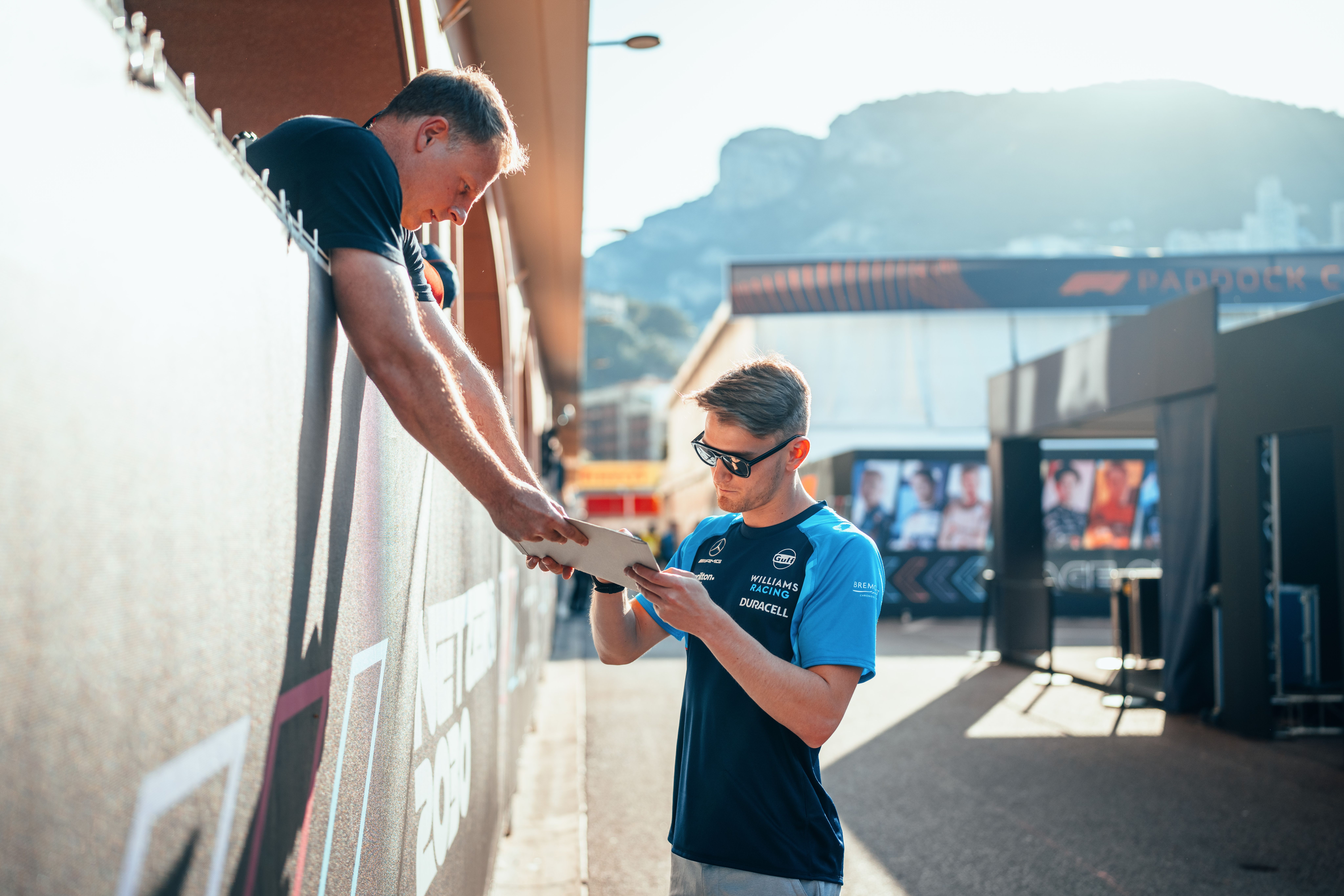 Doing the most to get that precious signature.