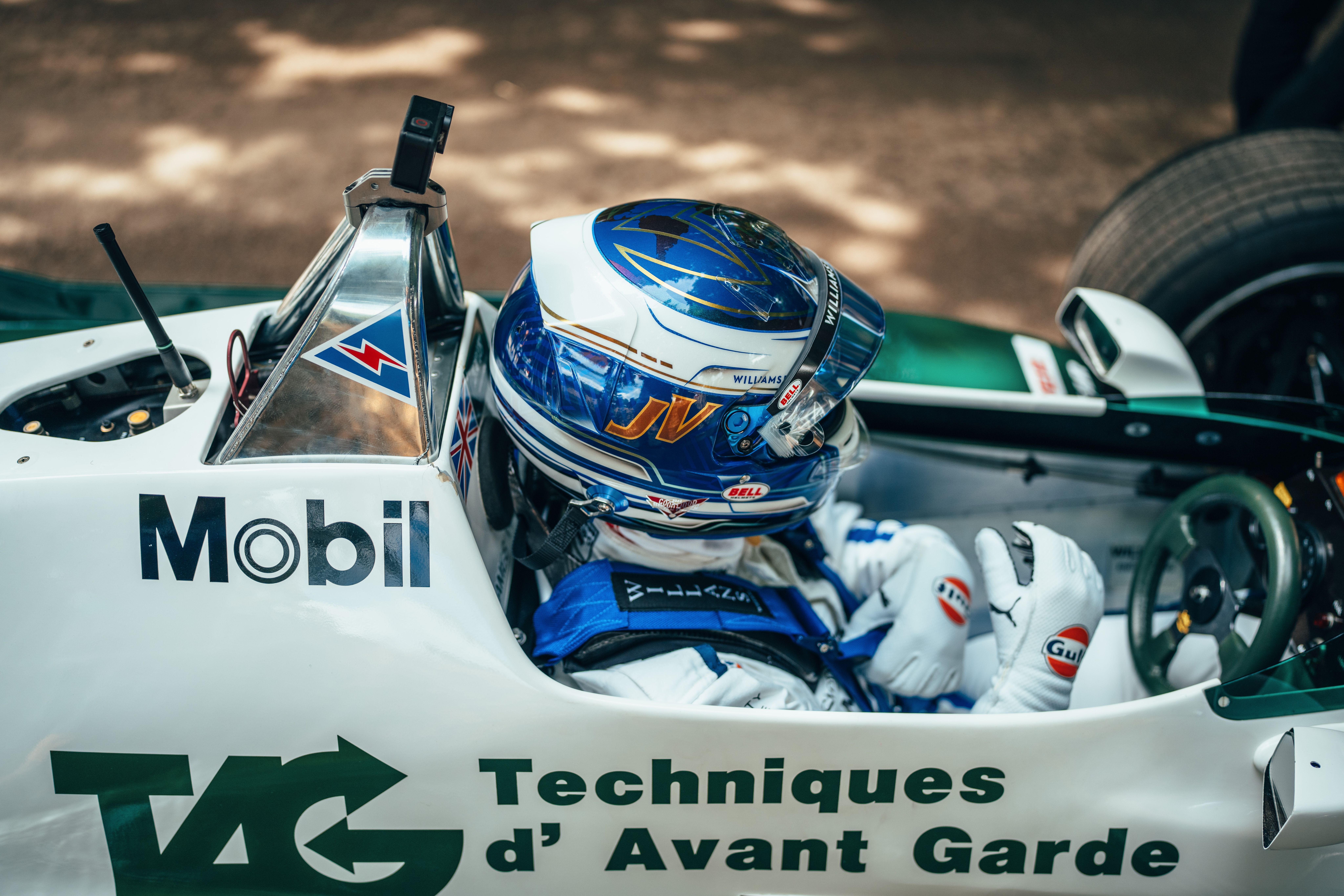 From the pit wall to the cockpit.