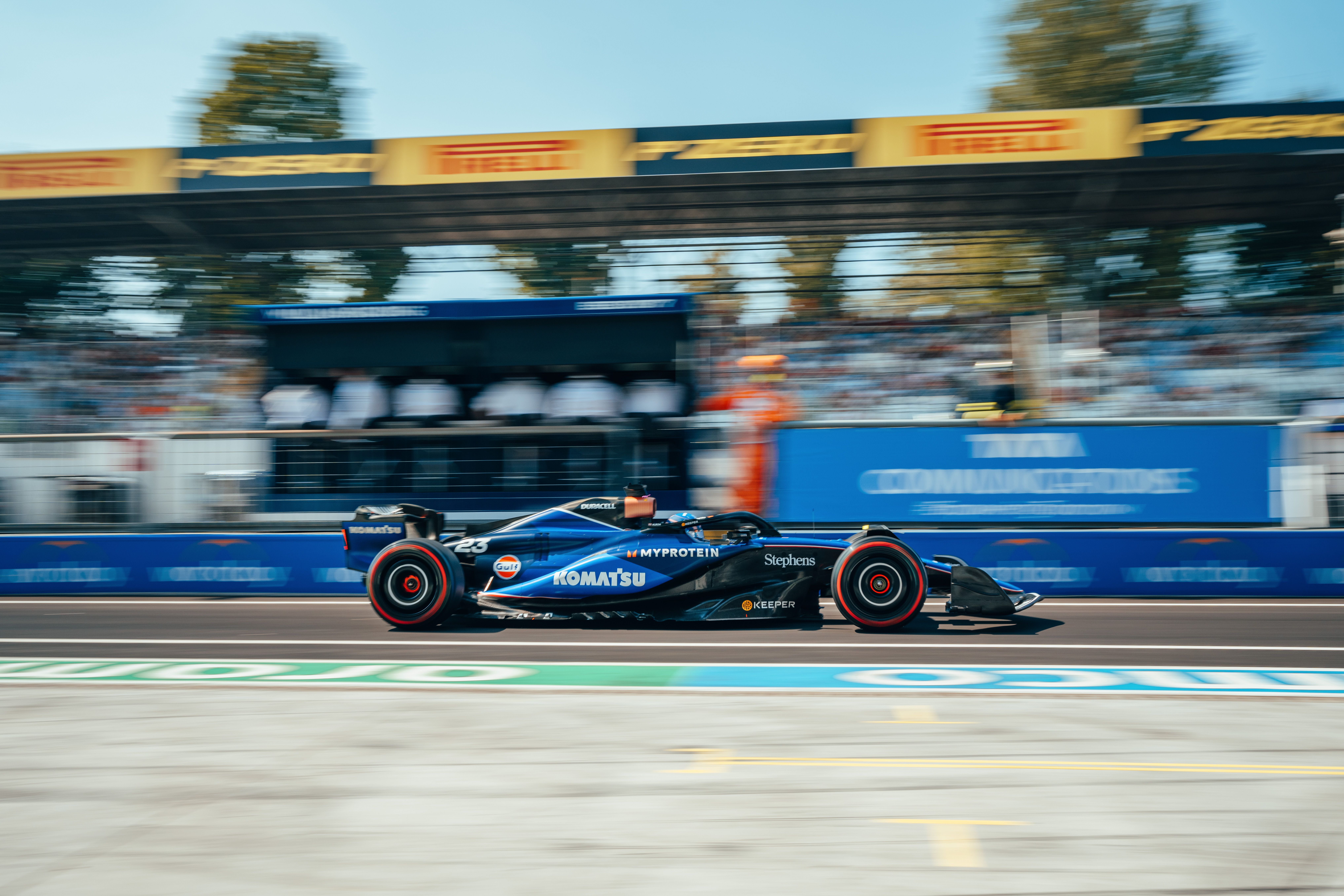 Flying through the pit lane.