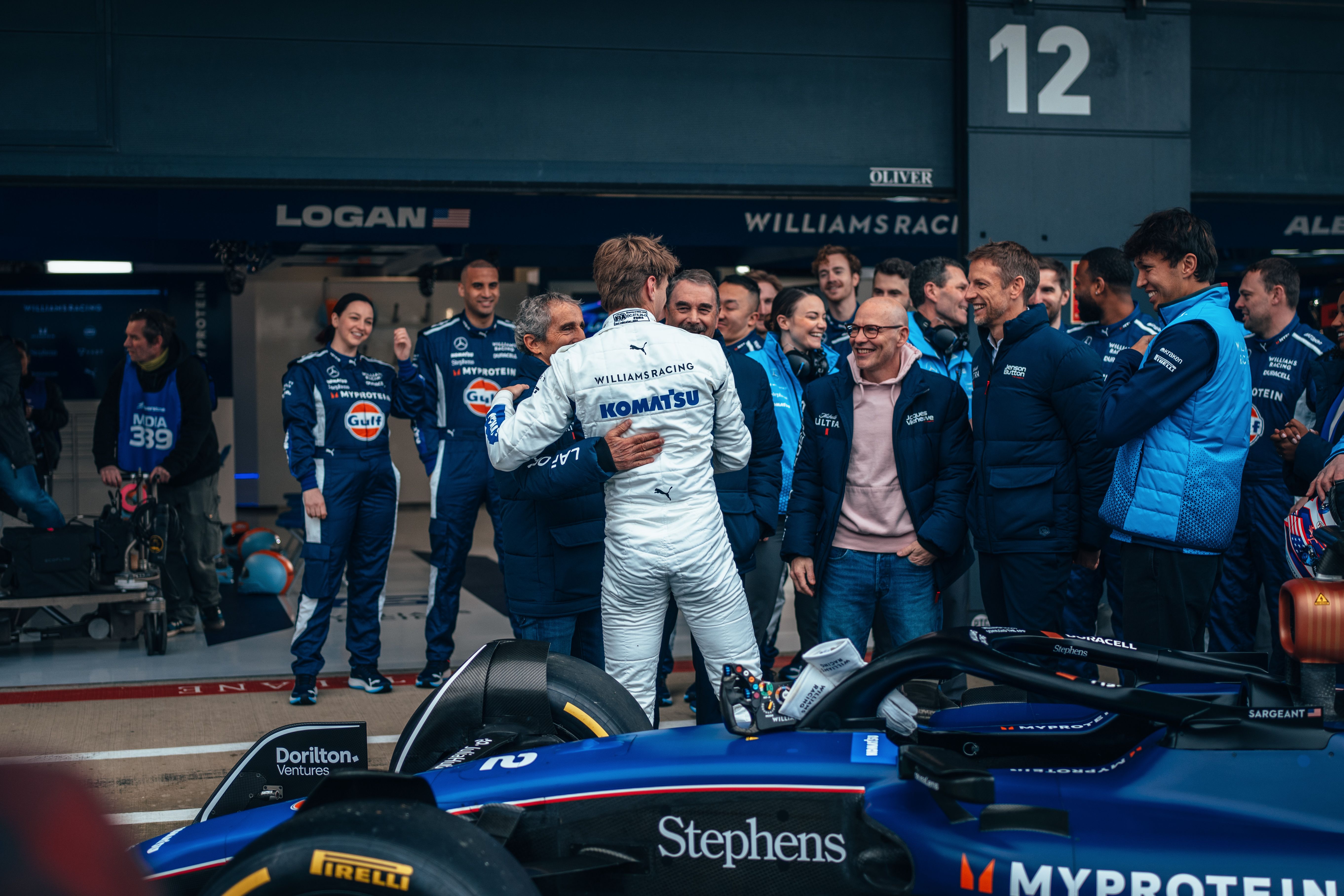 A pat on the back from Prost.