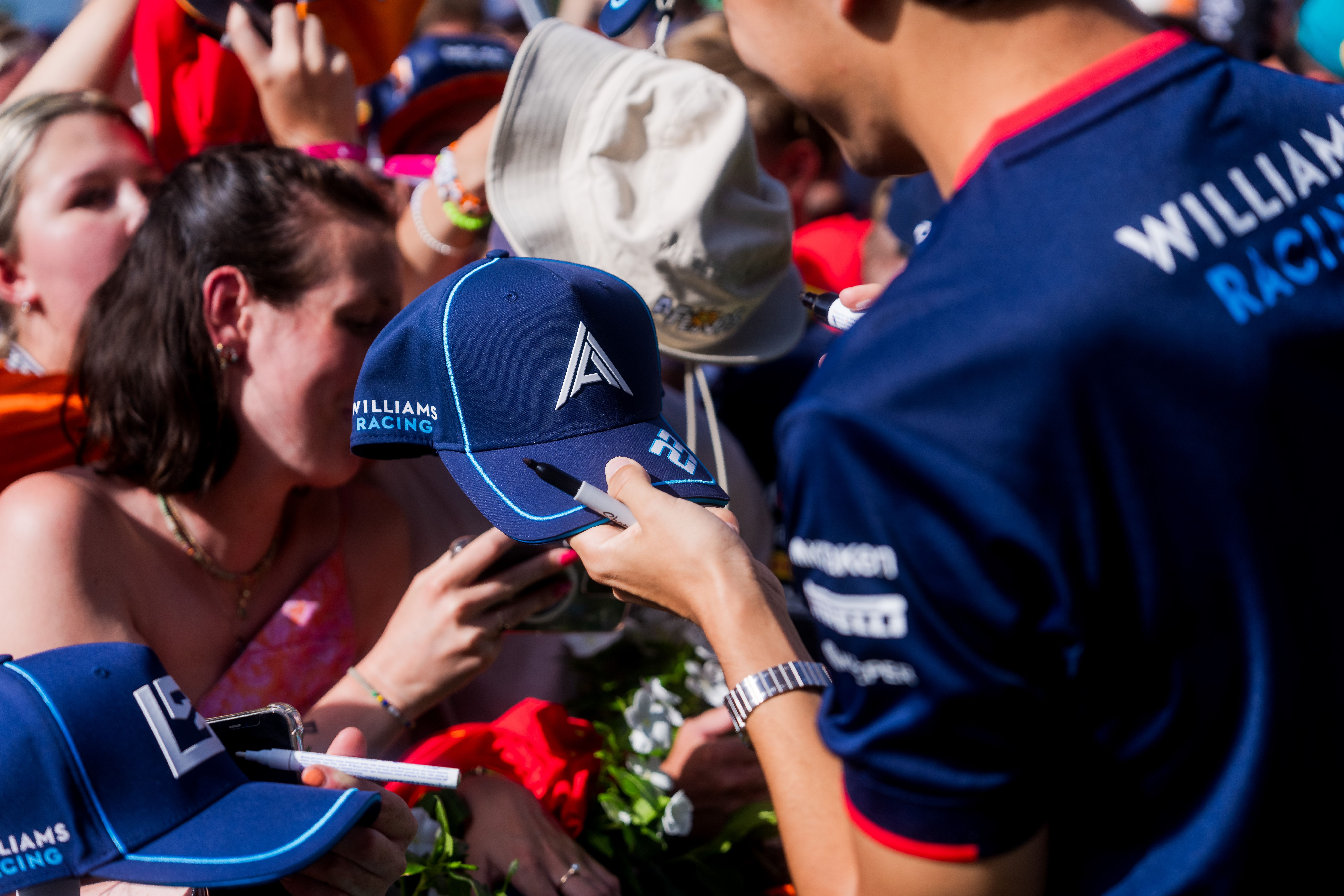 Plenty of hats to sign...