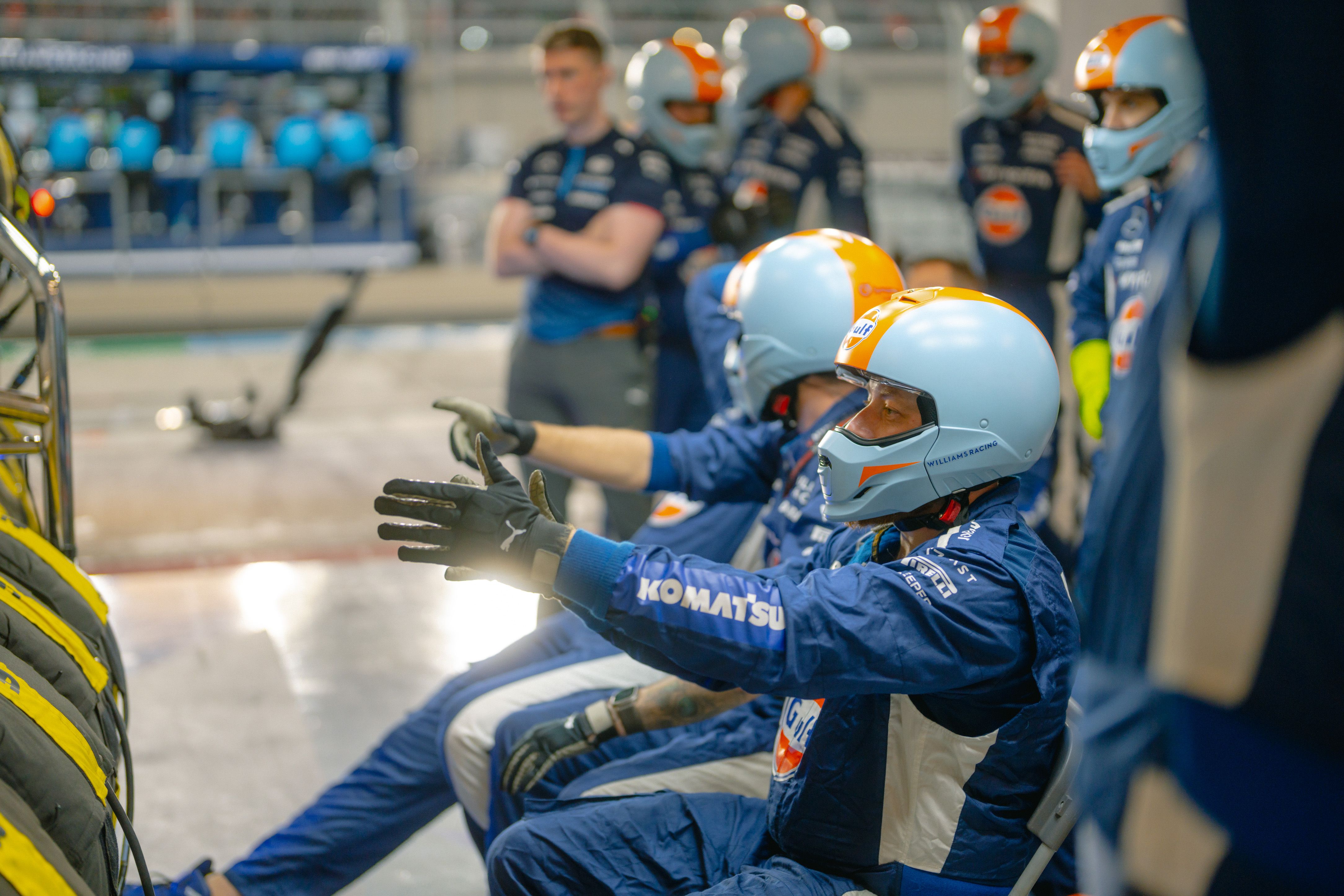 The mechanics react to the race.