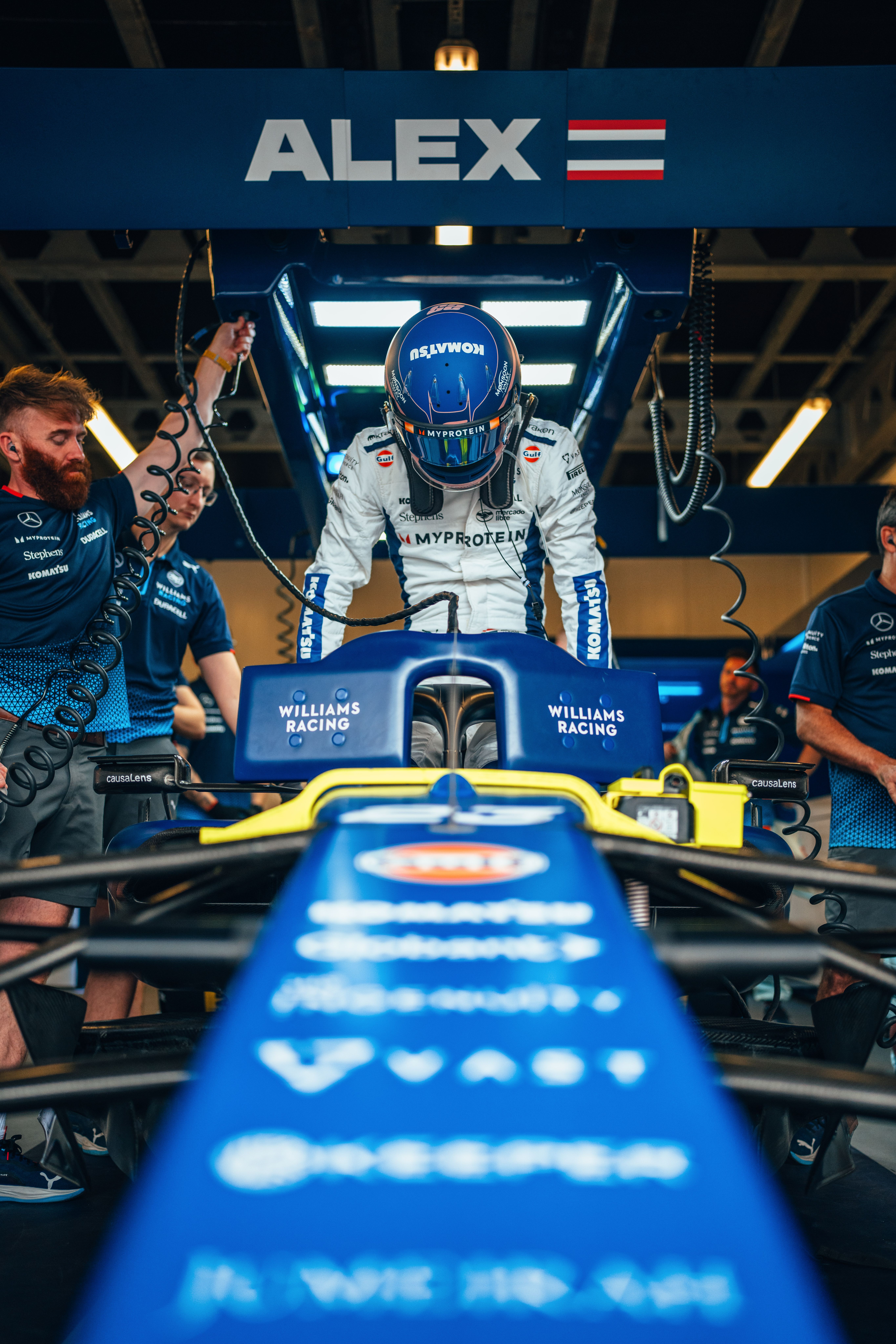 Alex lowers himself into car 23