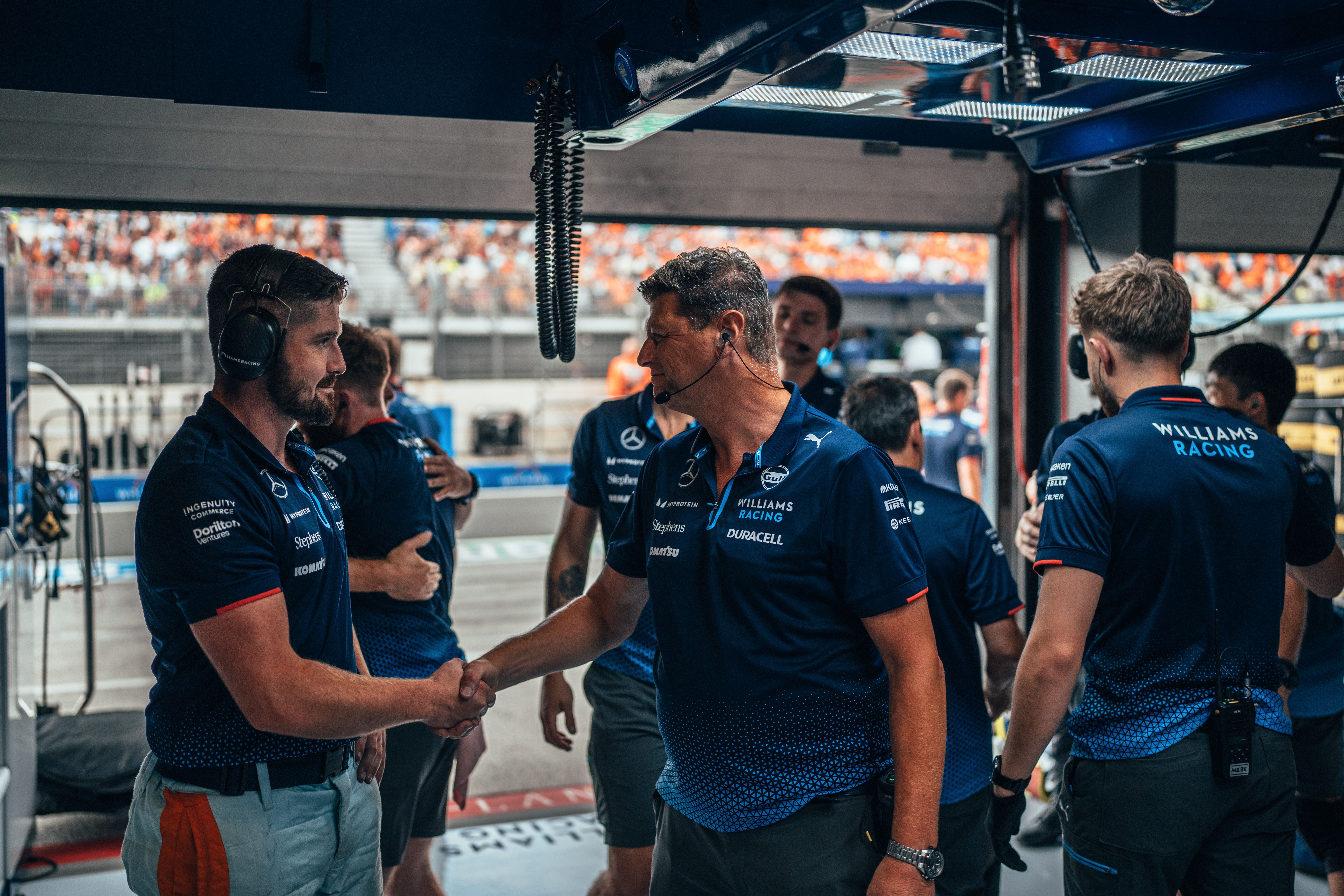 Handshakes all around.