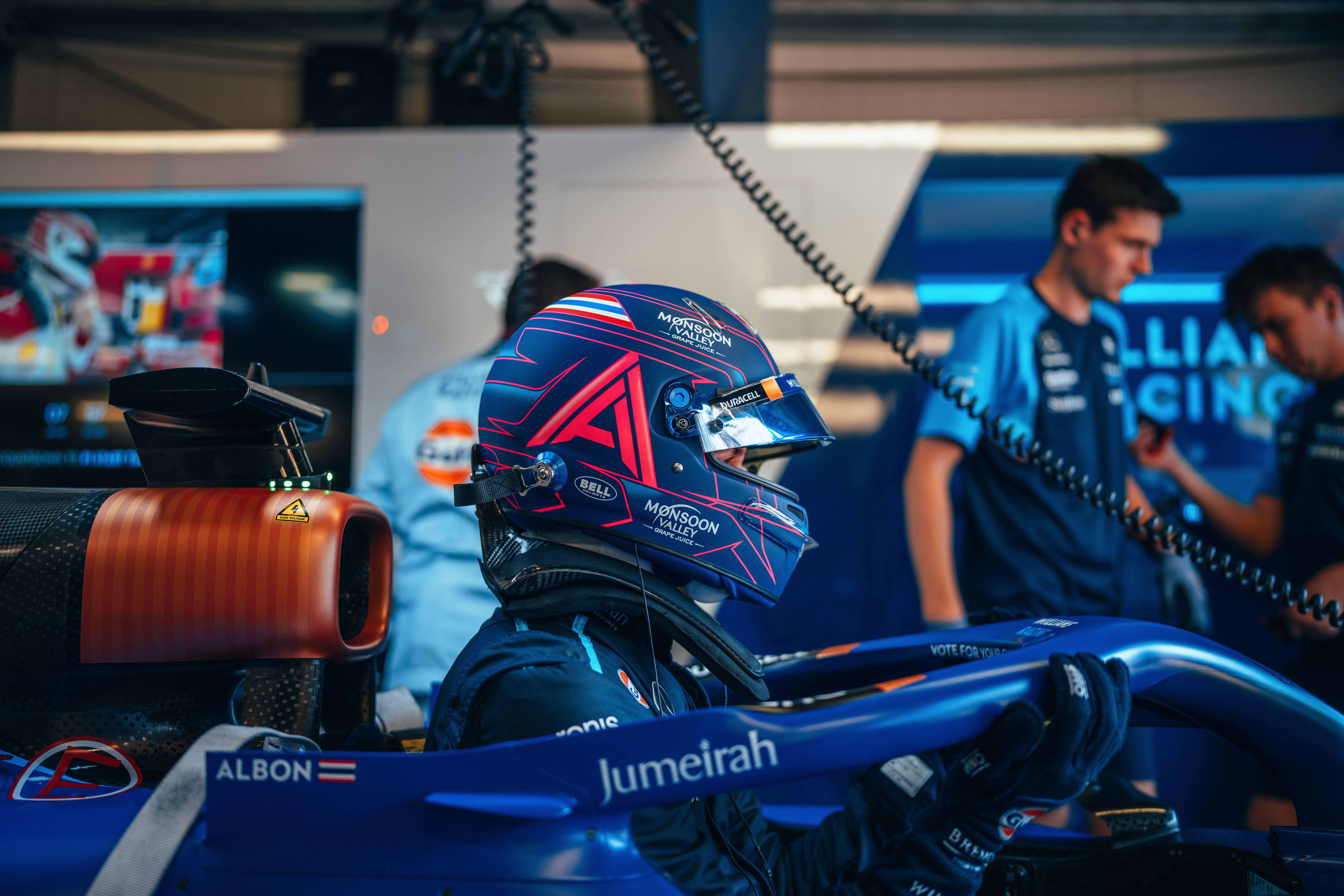 Climbing in for a drive around the city he calls home.