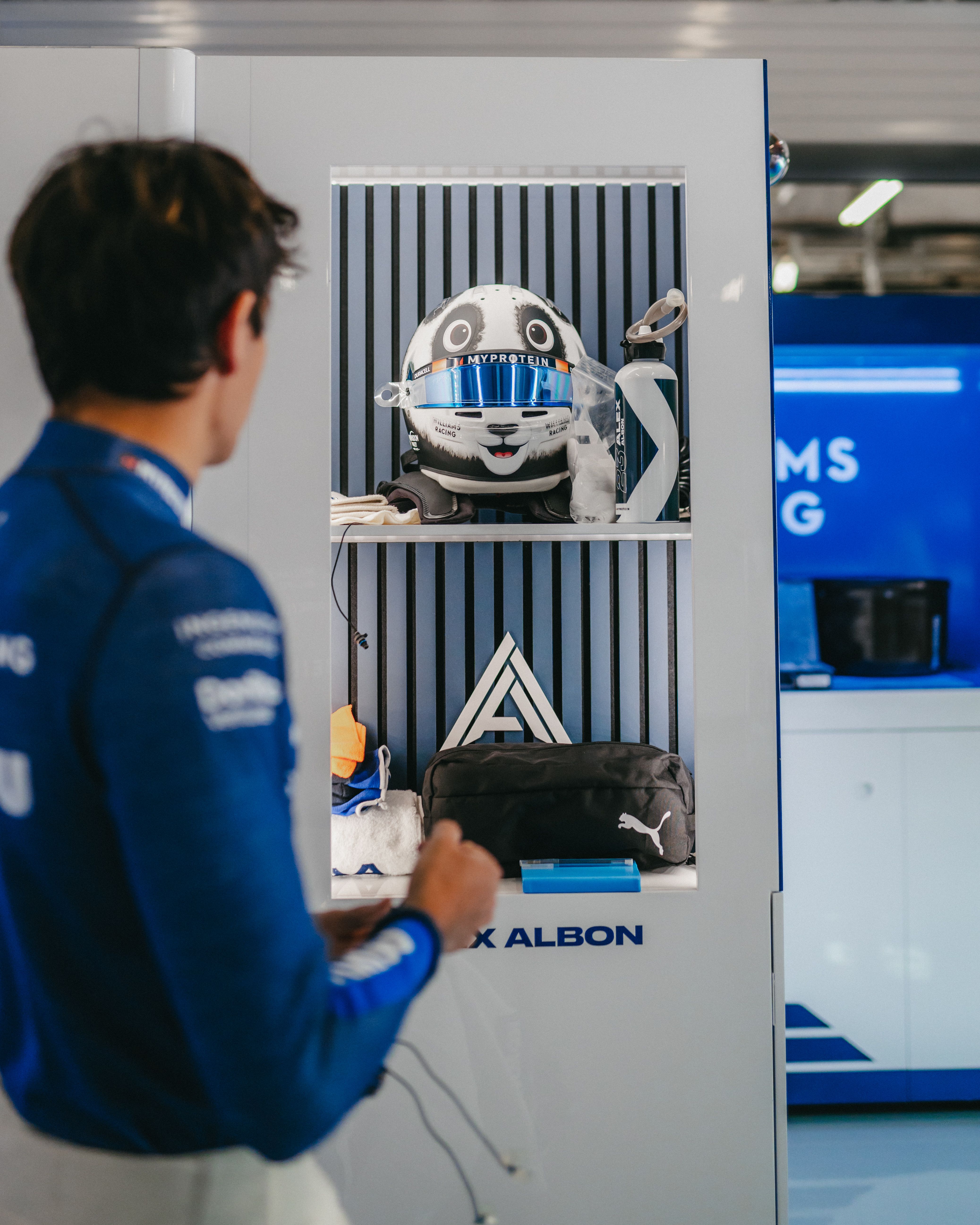 Alex looks at his new lid for the weekend.