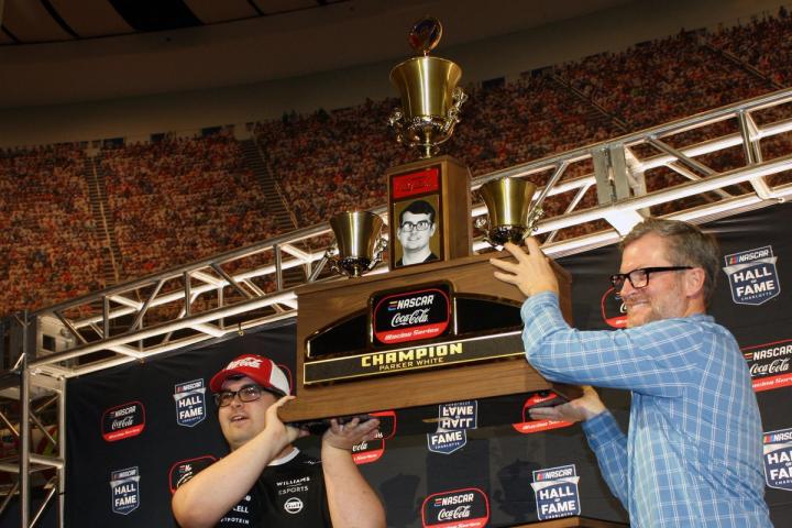 Parker receives the Dale Earnhardt Jr. Cup from the man himself.