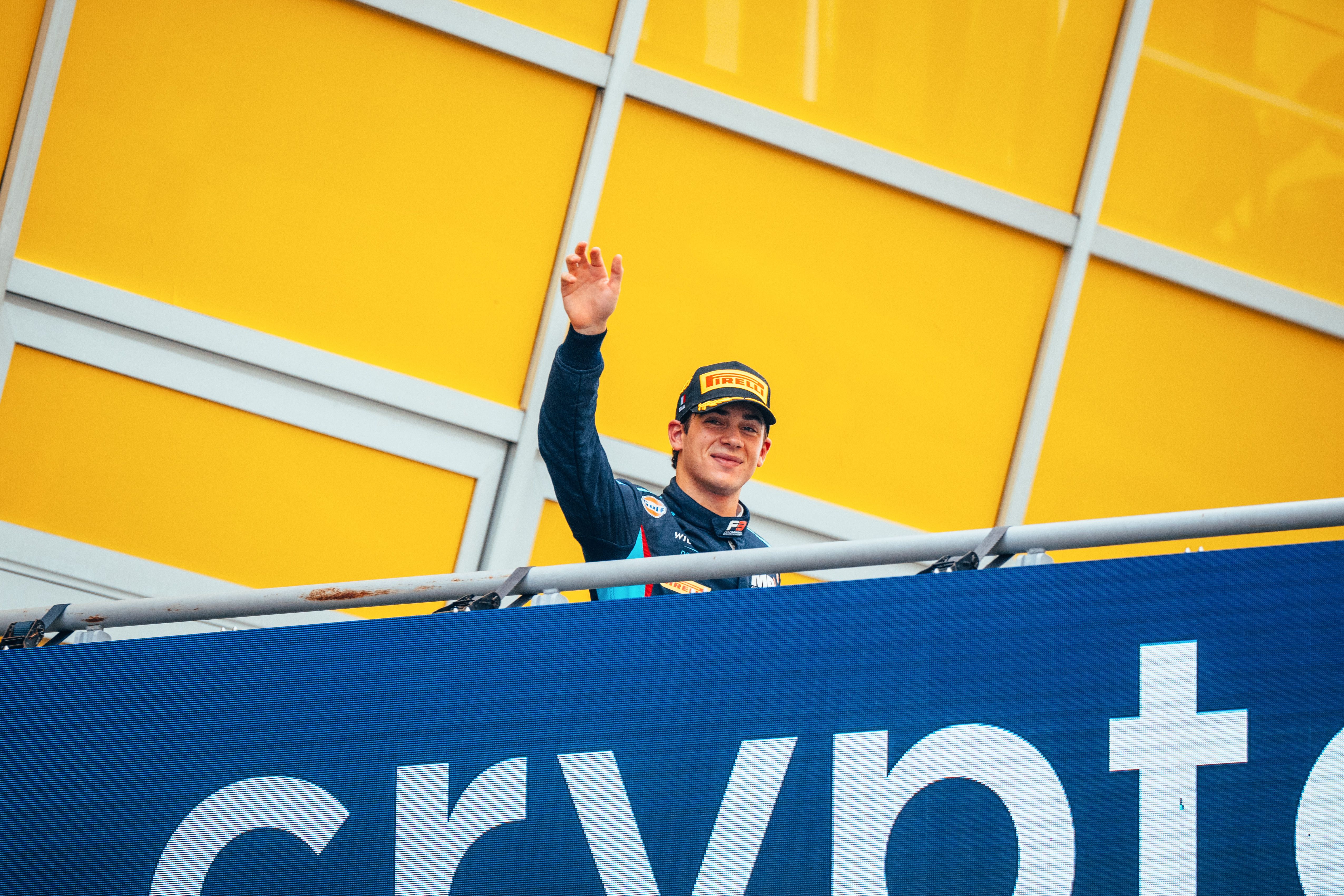 Our Williams Racing Driver Academy driver takes to the podium to celebrate his win.