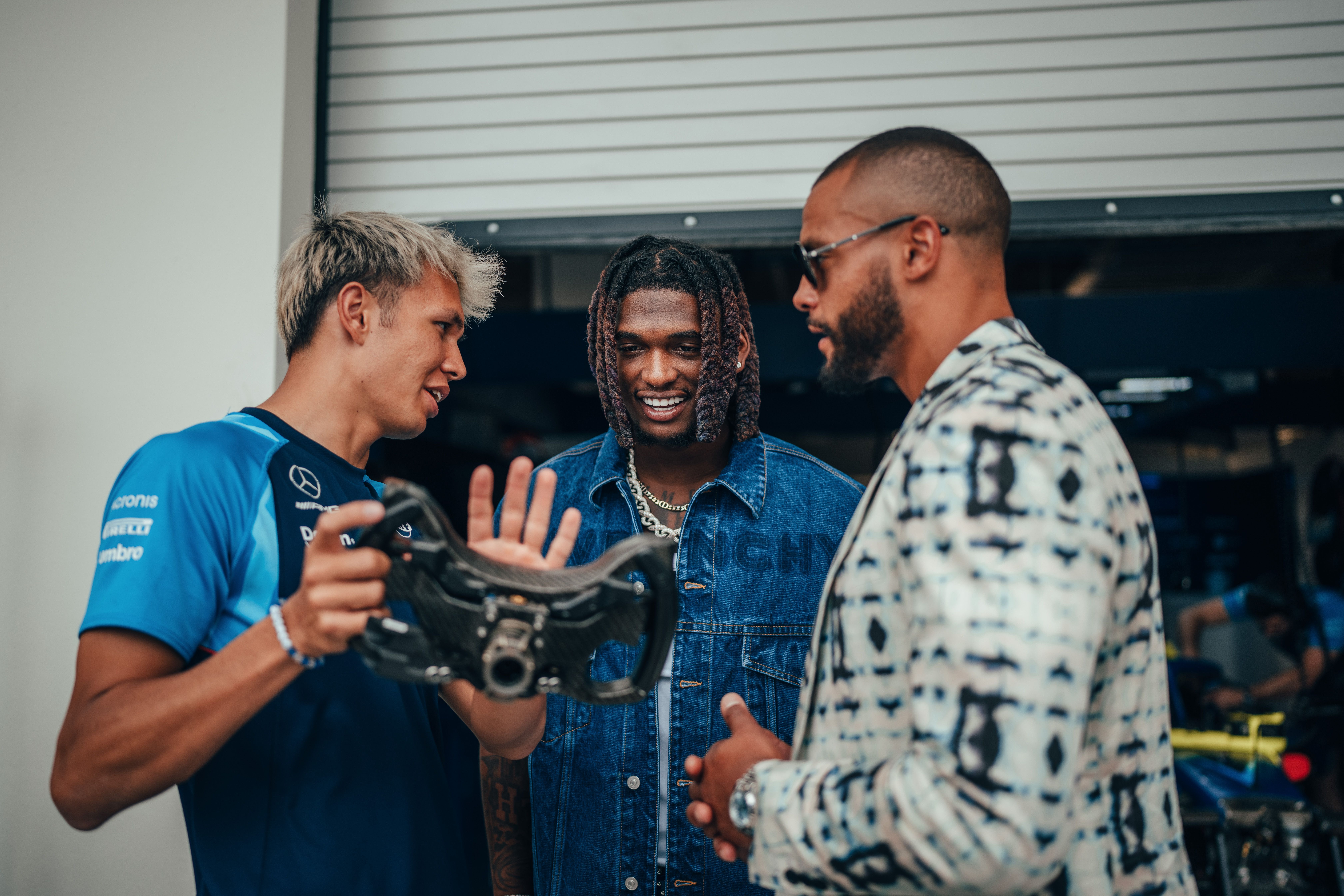 Miami brought out the stars. Here’s Alex showing NFL players CeeDee Lamb and Dak Prescott the ropes.