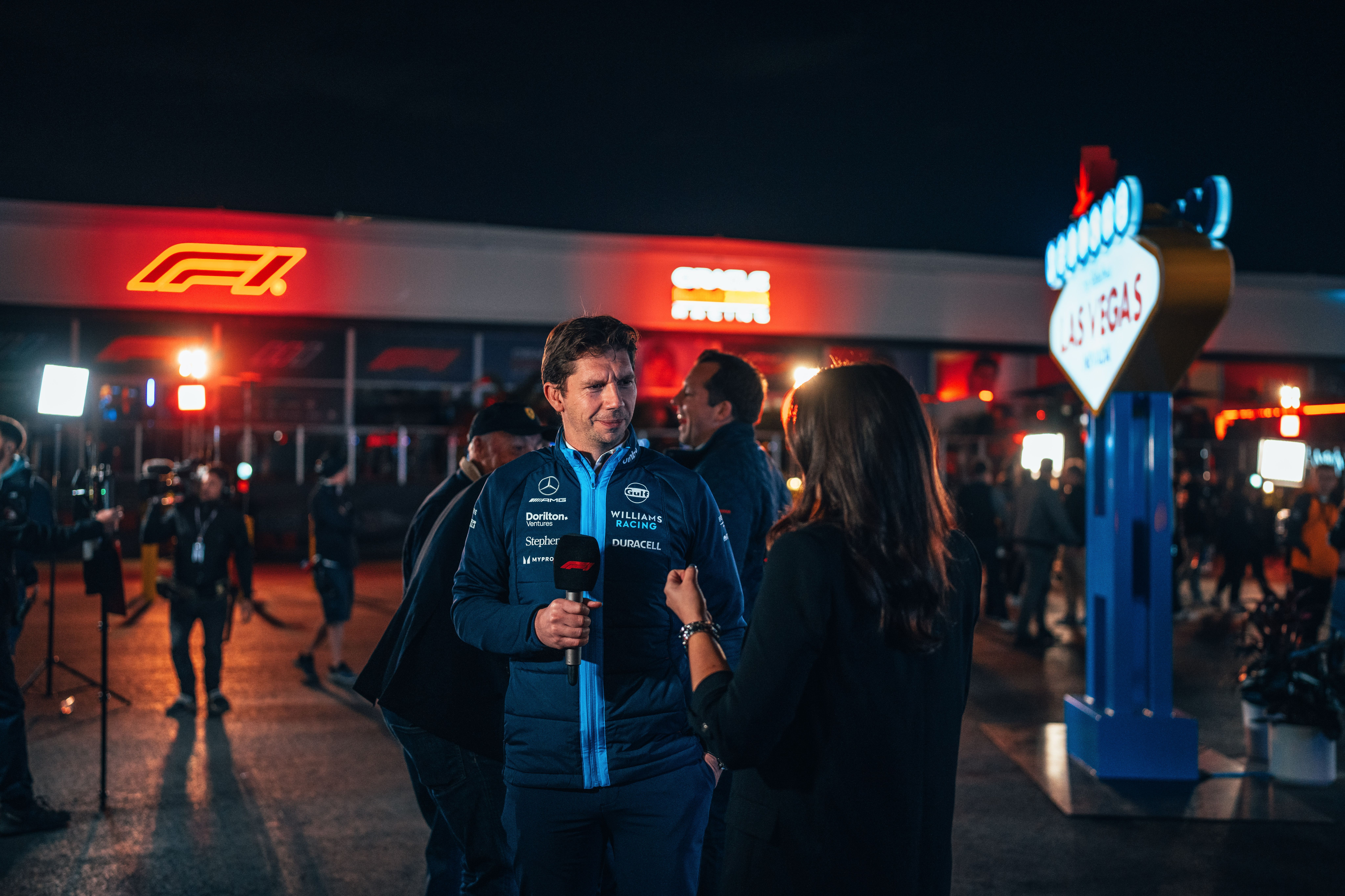 A happy Team Principal chats to the media.