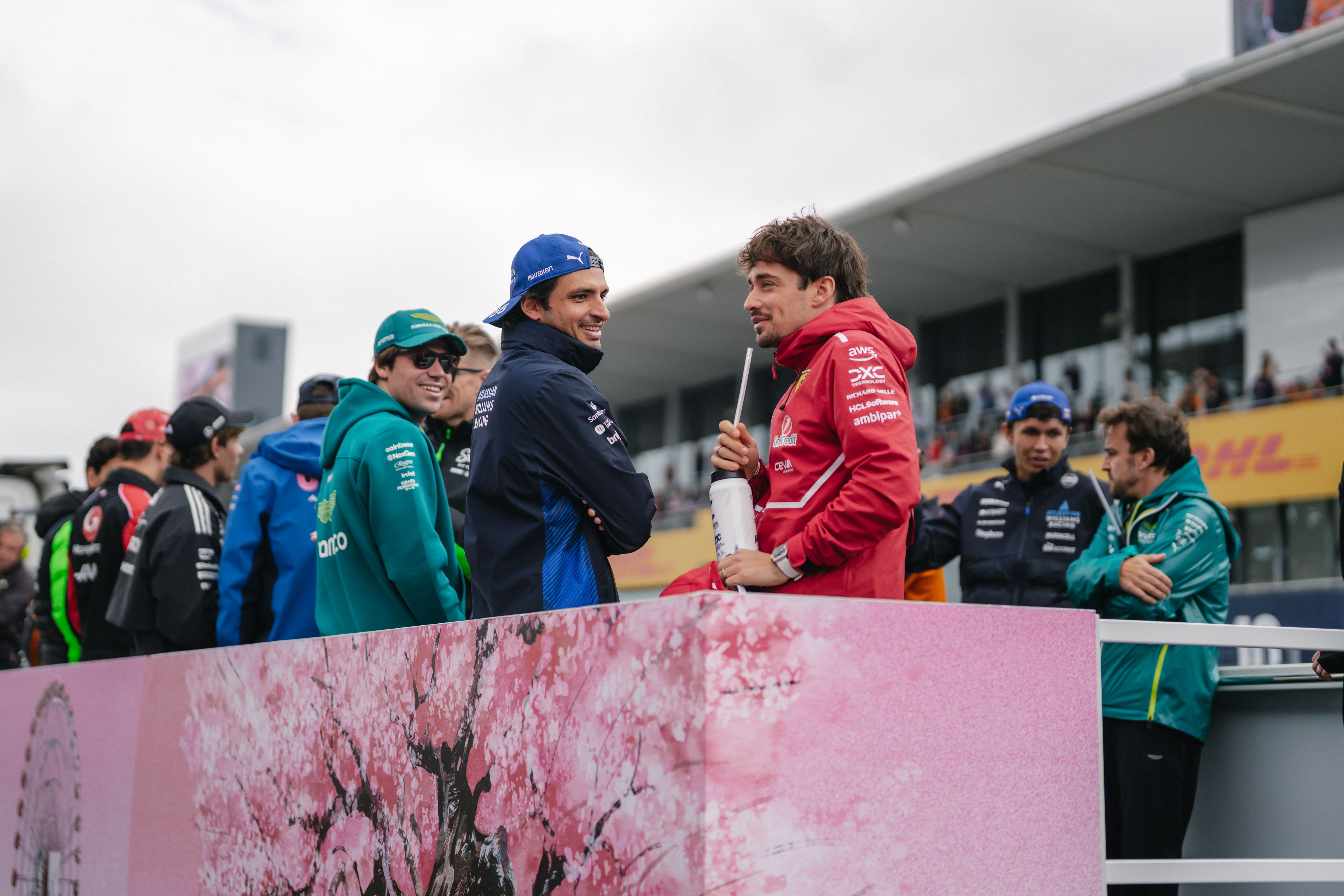 Carlos shared a smile with Charles Leclerc on the Sakura-themed vehicle