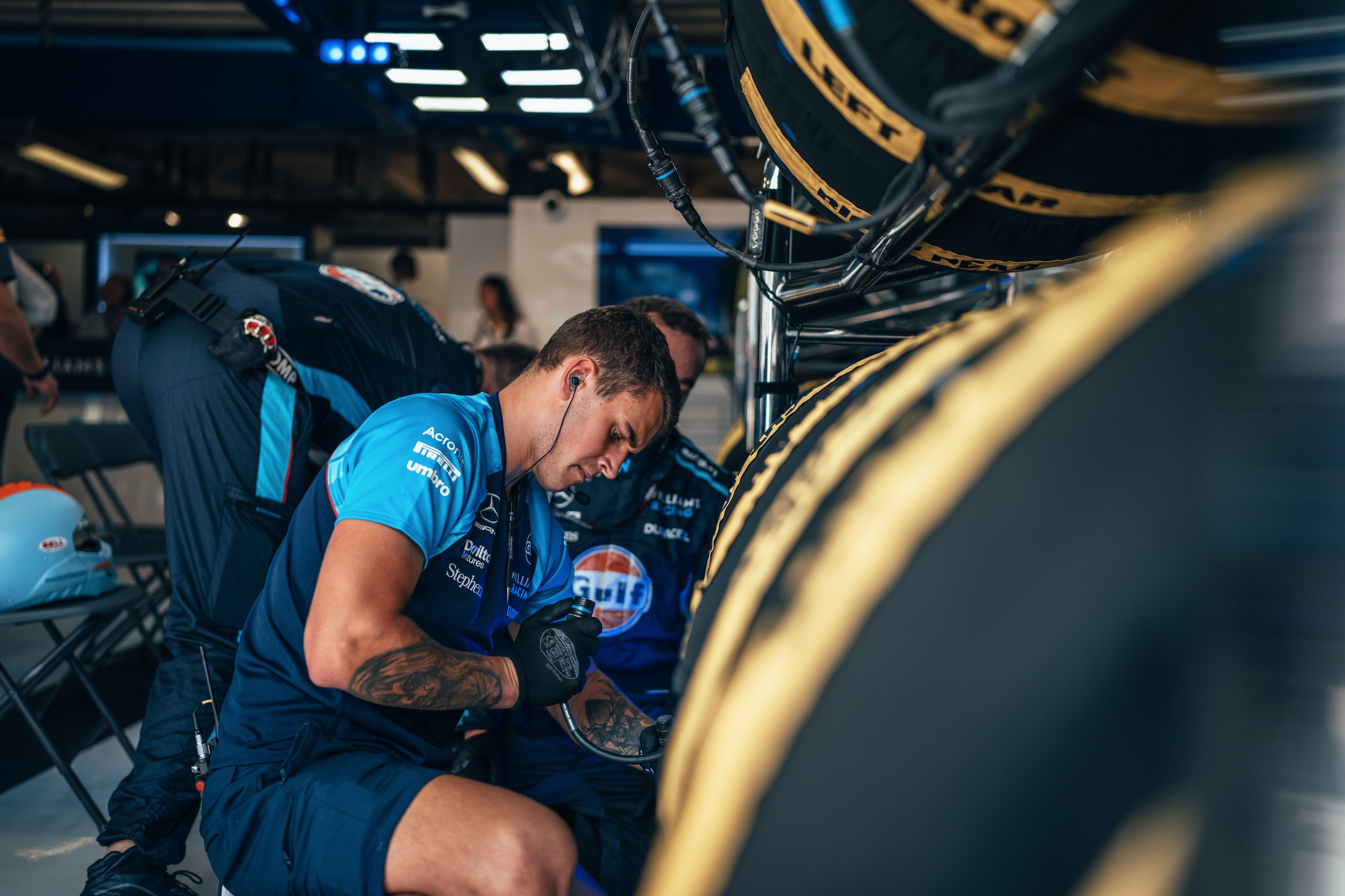Final preparations for the race in the garage as the all-important tyres get checked.