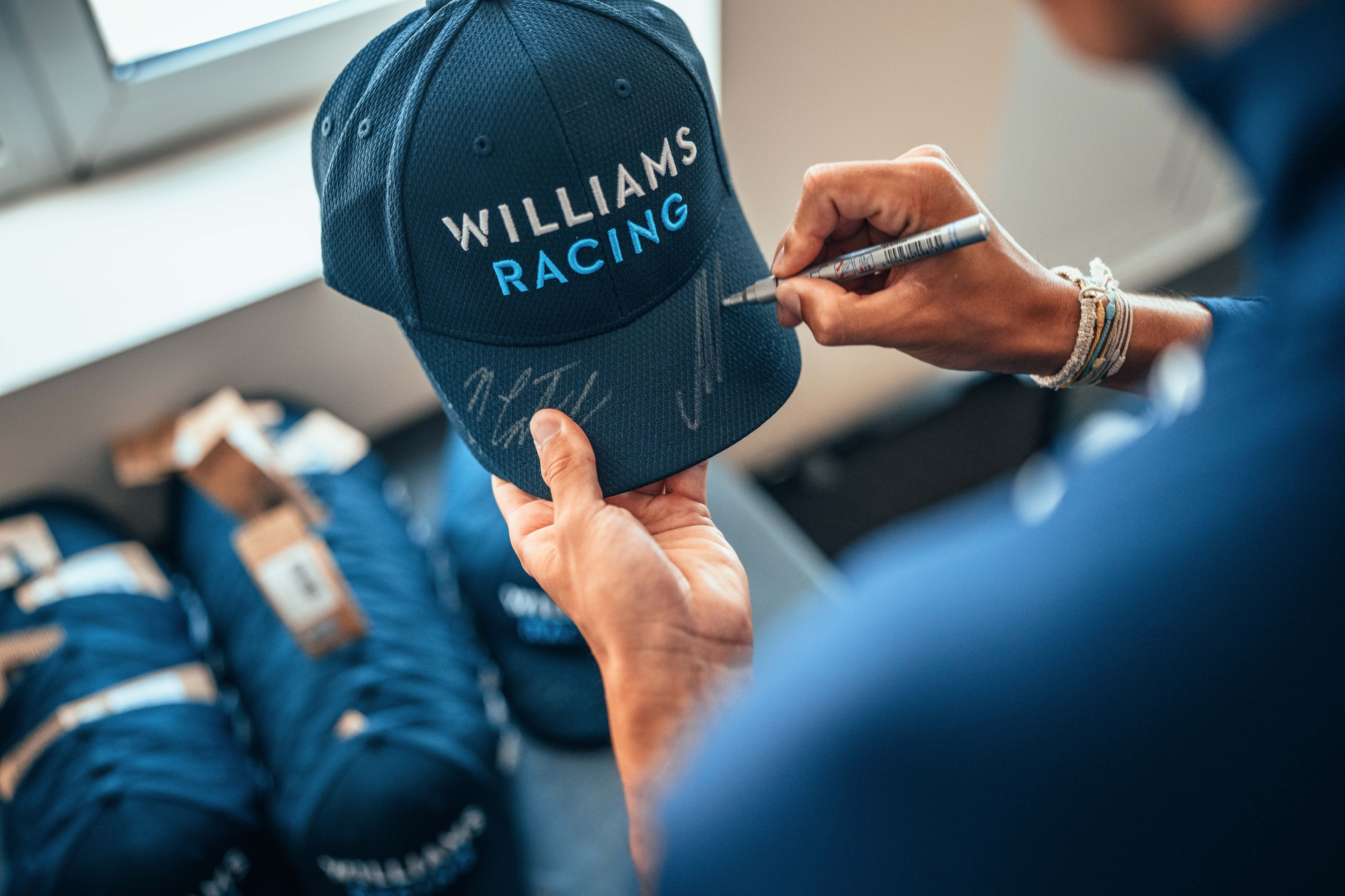 Signing their lives away!