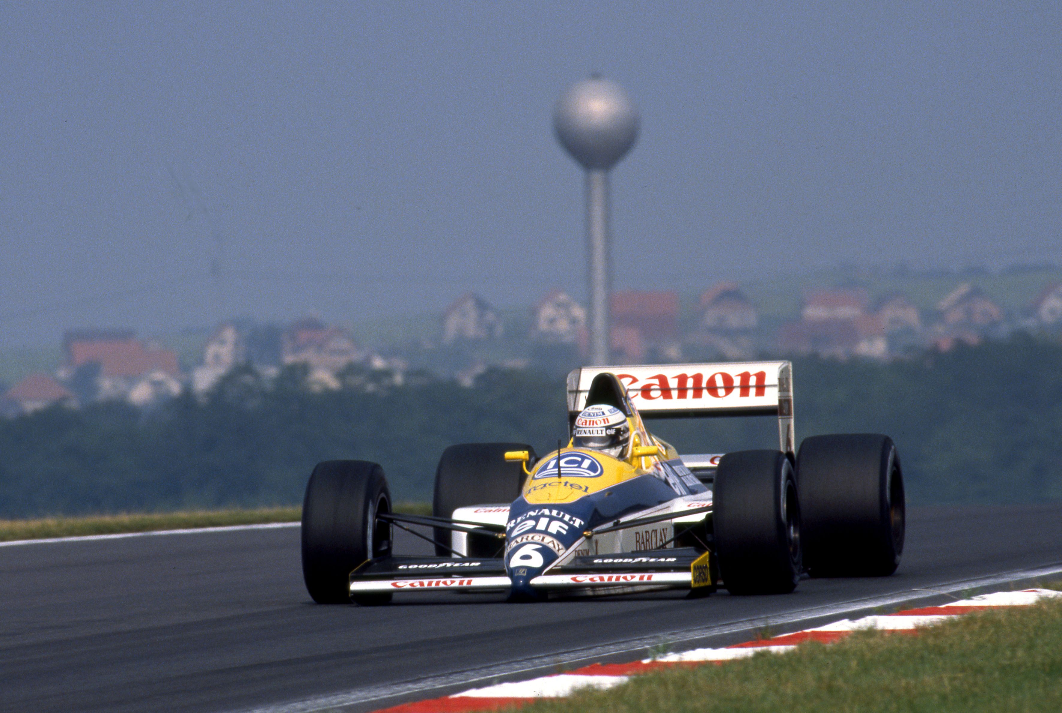Riccardo Patrese in the FW12C at the 1989 Hungarian GP, one of the most recognisable backdrops at the Budapest venue.