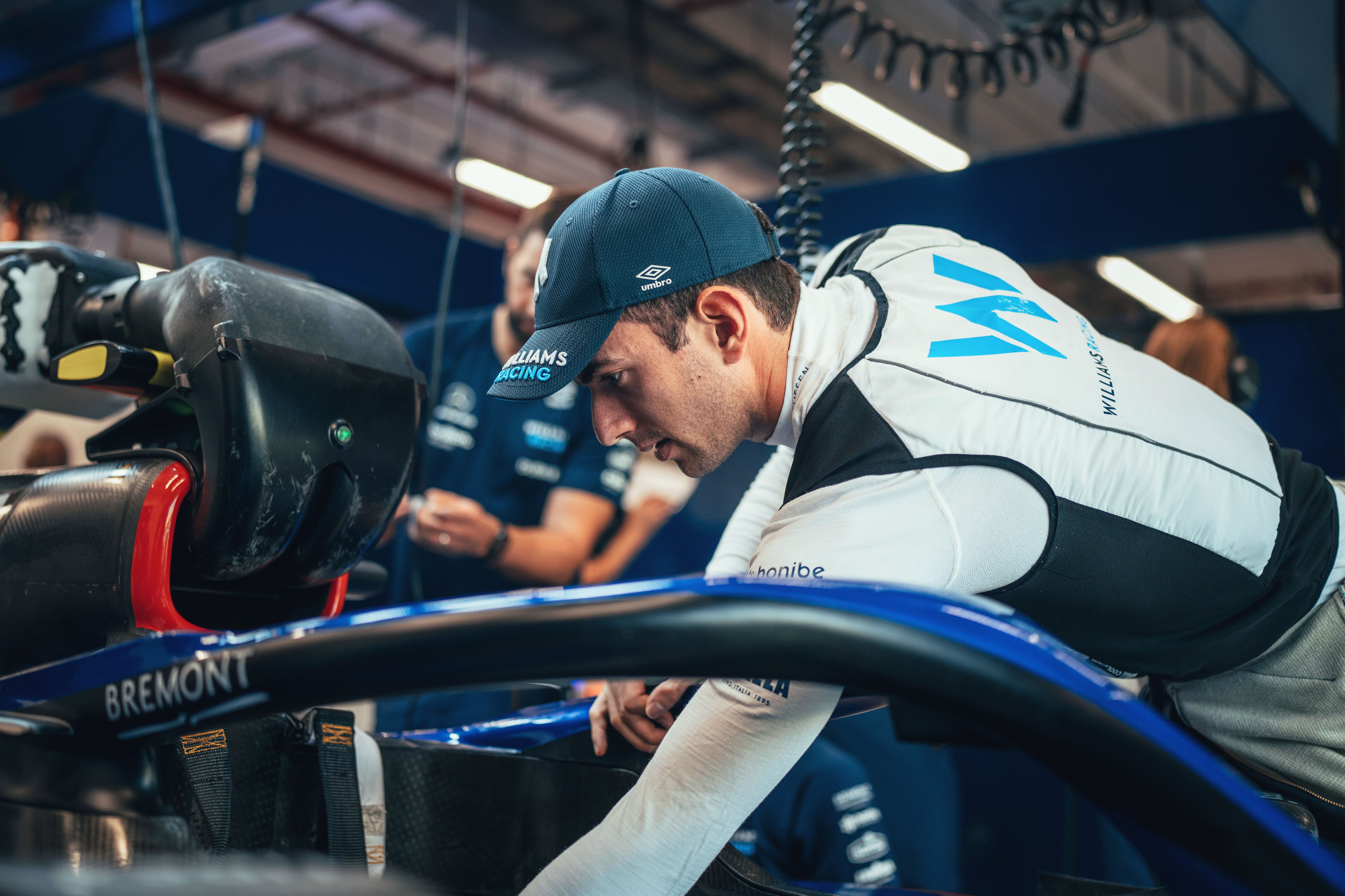 Nicky checks everything is right in car number six.