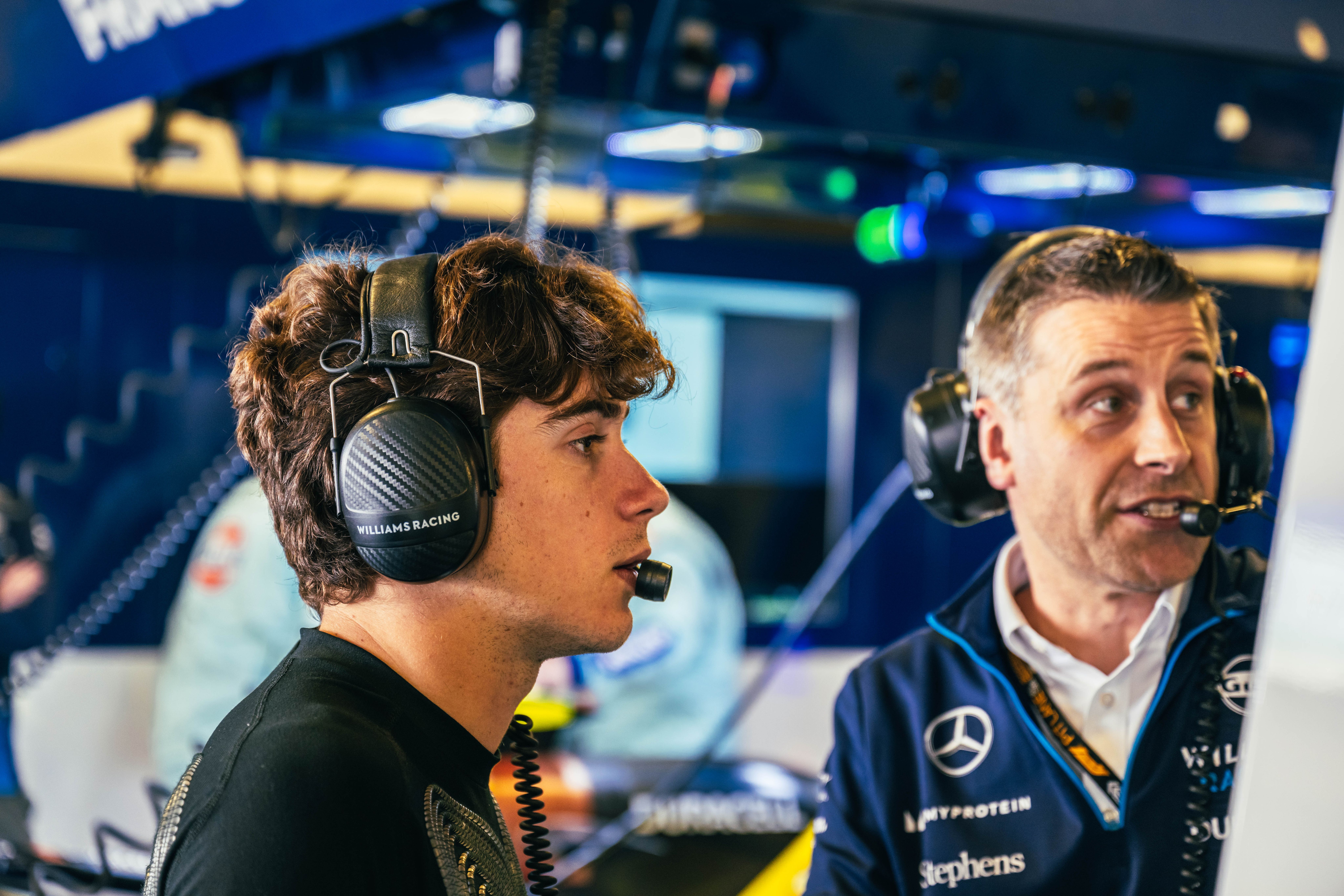 Franco checks the data in the garage