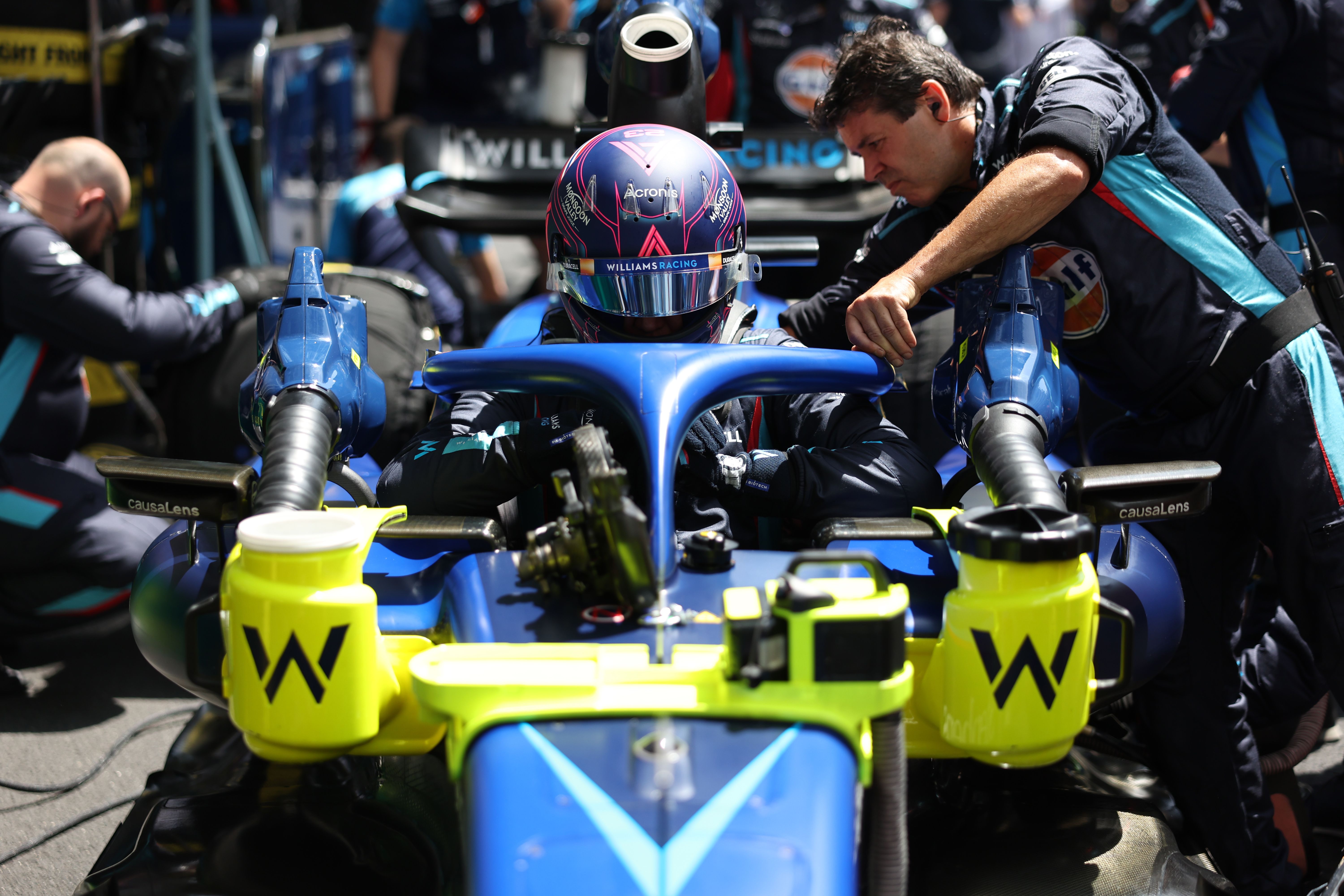 Albono jumps in the cockpit ready for the formation lap.