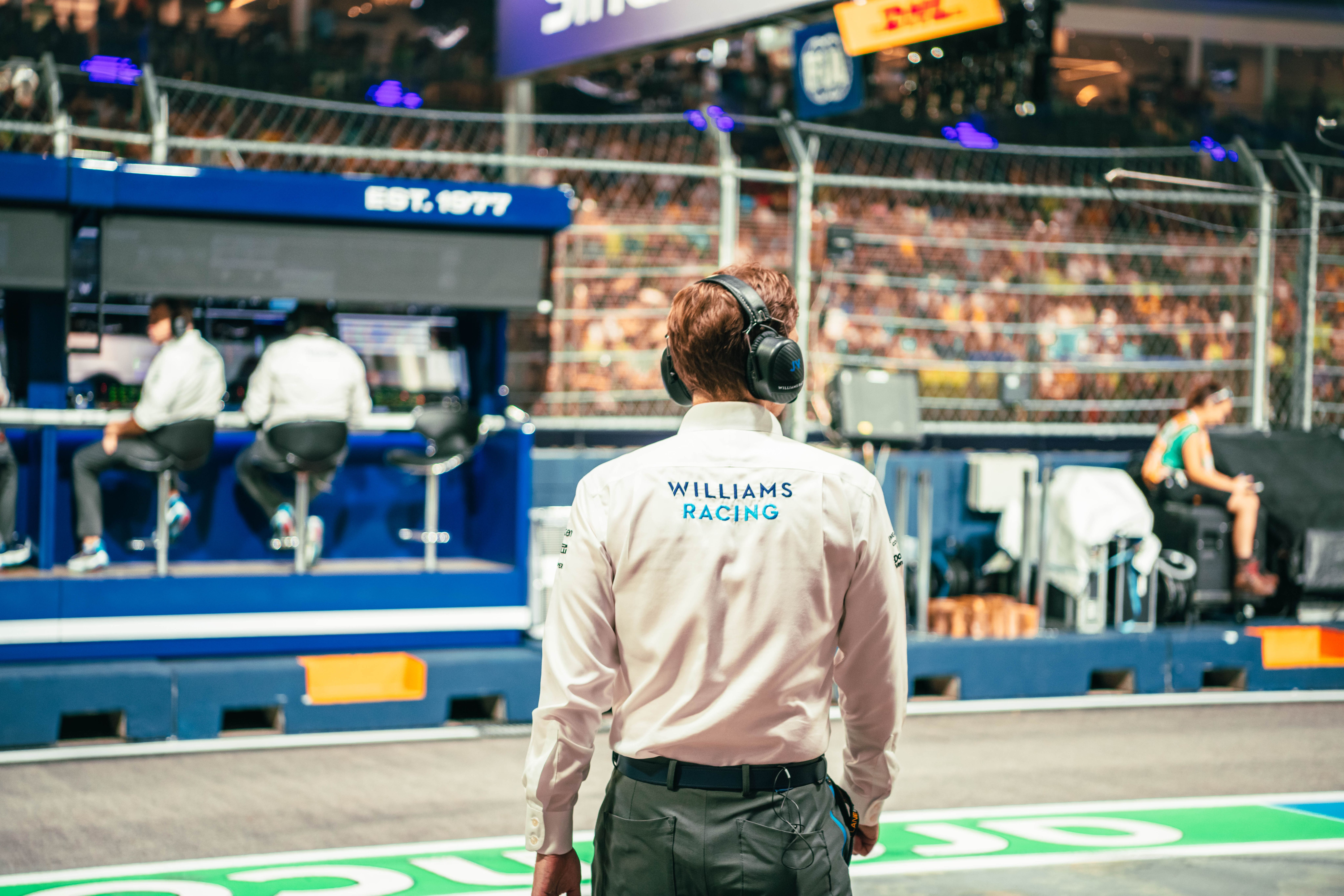 JV heads back to the pit wall.