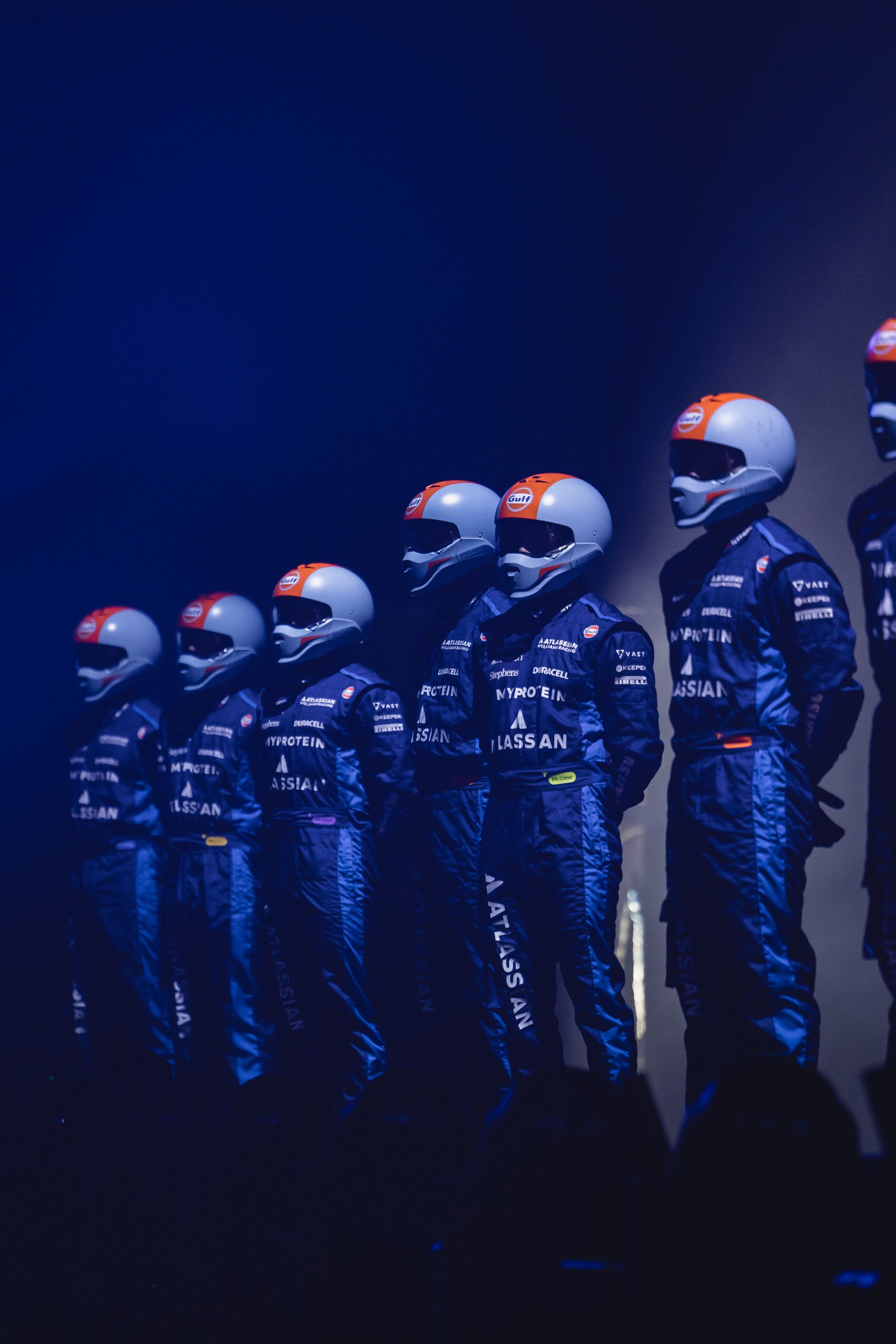 A moment for the pit crew suits.