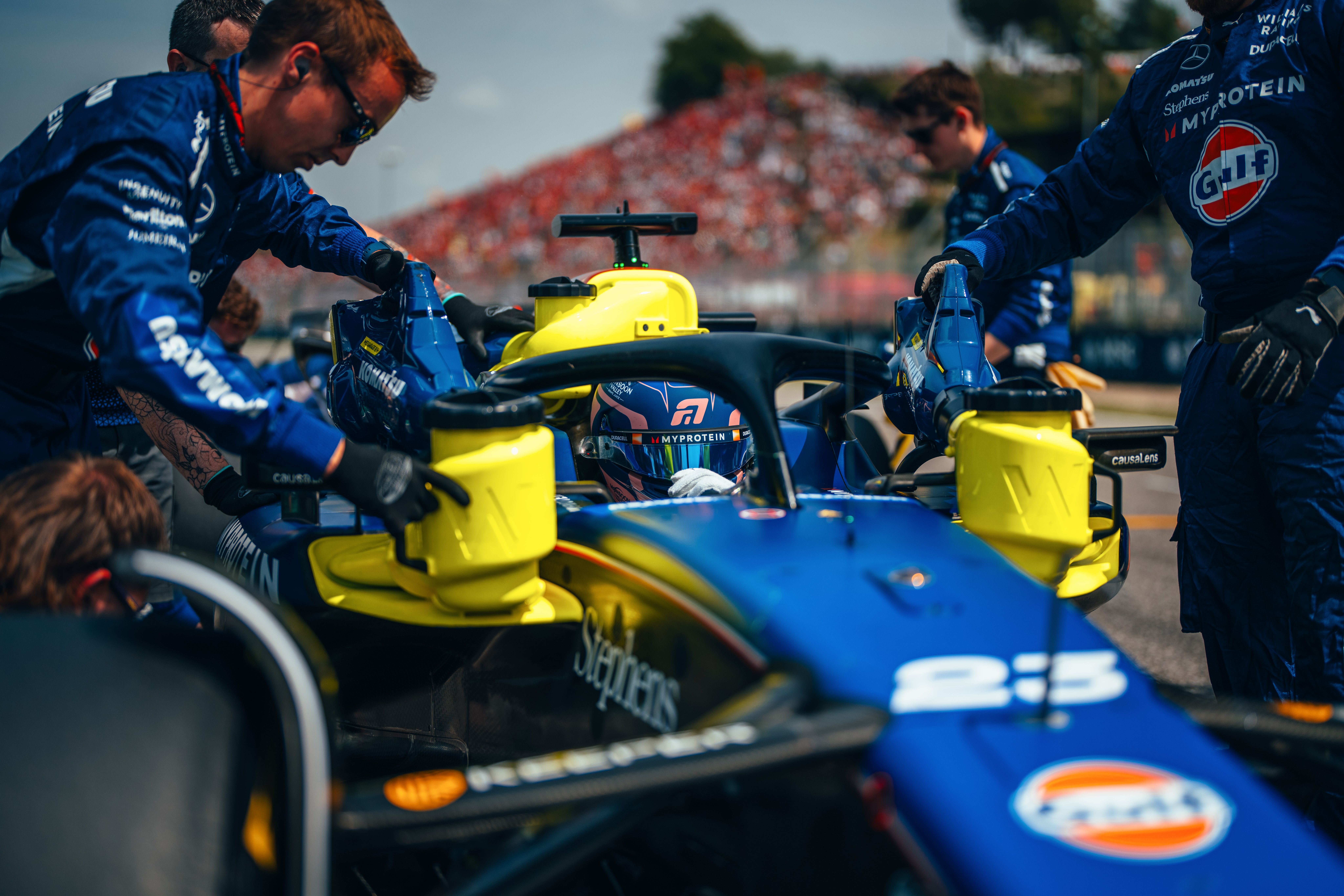 Alex jumps inside the cockpit of his FW46.