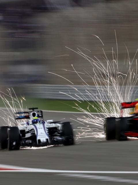 Sparks fly down the main straight in 2016 as Felipe Massa battles a Red Bull.