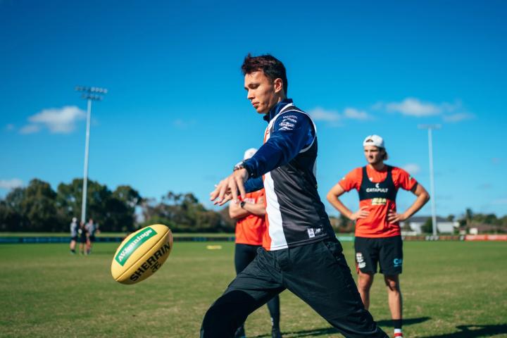 Alex Albon playing AFL with St Kilda in Melbourne, Australia