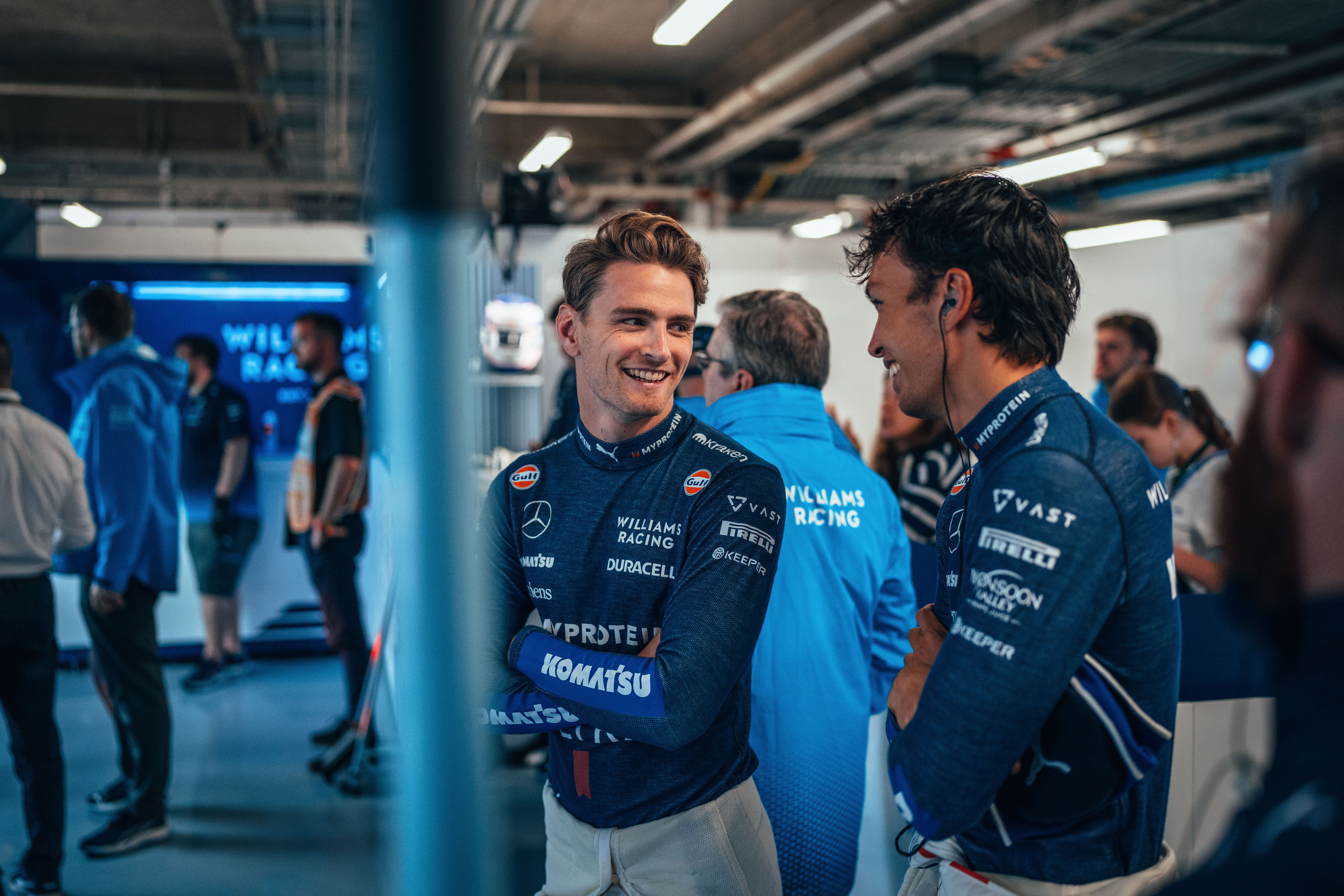 All smiles in the garage though!