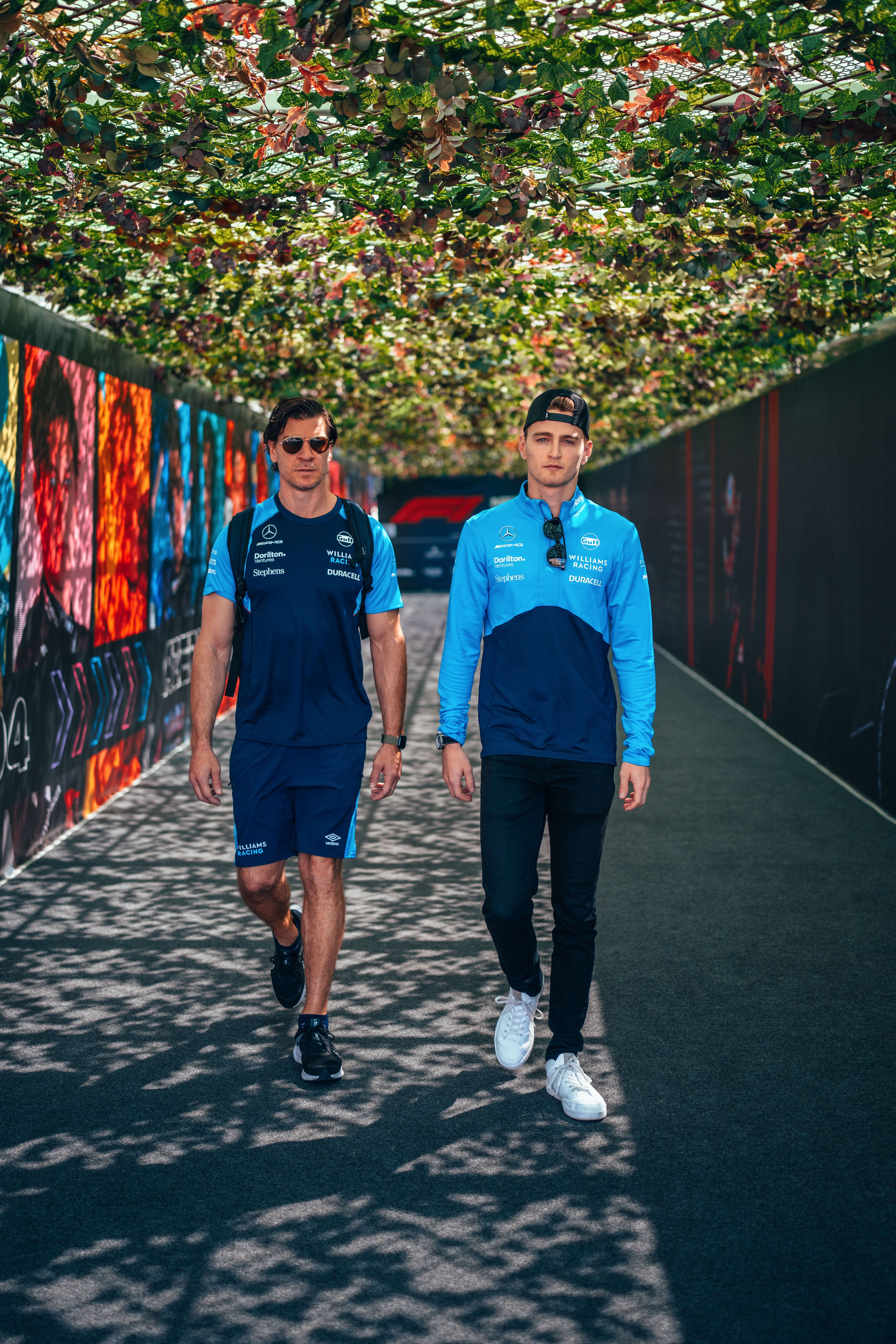 Ben and Logan stroll into a Sprint Saturday.